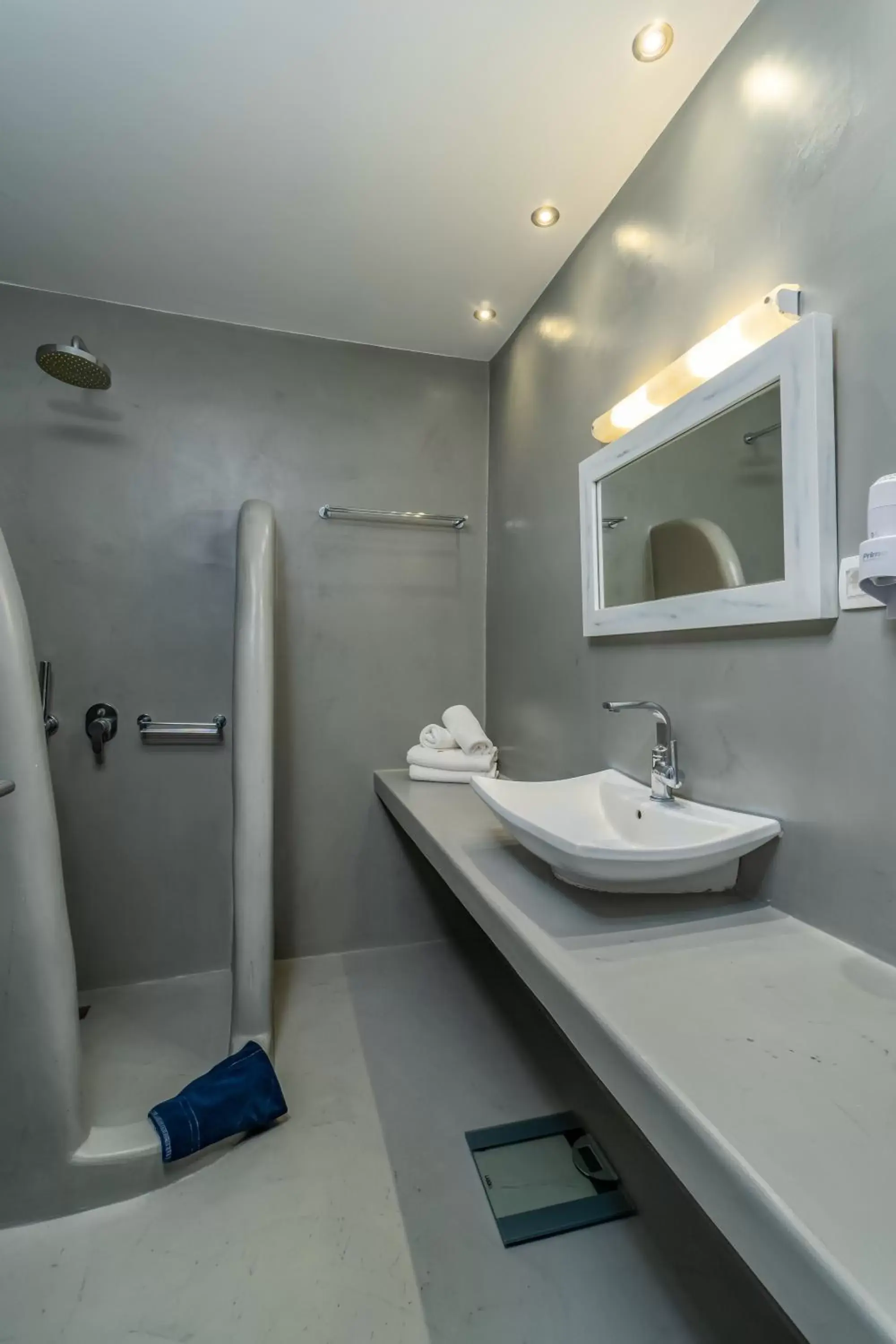 Bathroom in Central Fira Suites