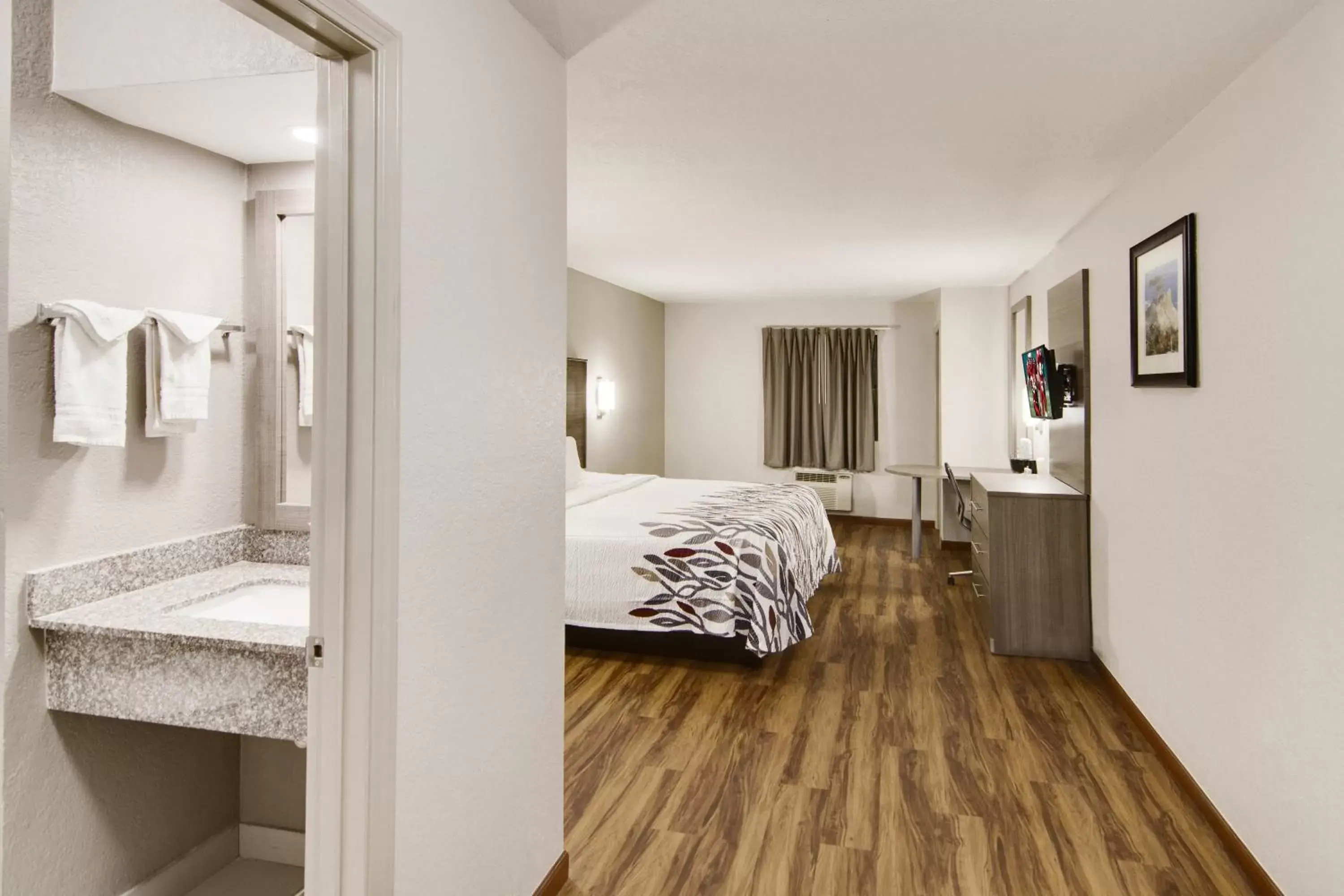 Photo of the whole room, Bed in Red Roof Inn & Suites Pensacola-NAS Corry Photo of the whole room, Bed in Red Roof Inn & Suites Pensacola-NAS Corry