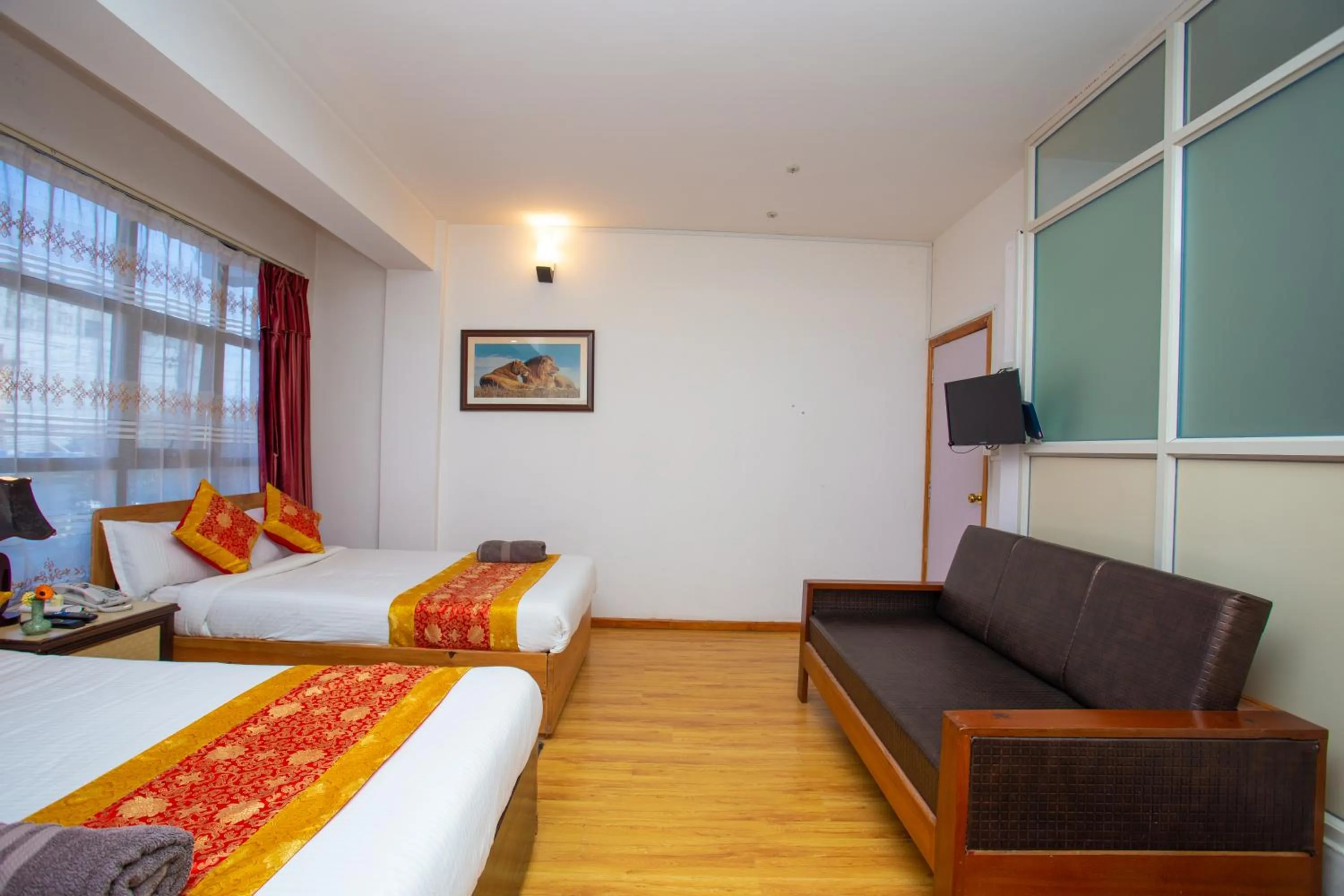 Photo of the whole room, Bed in The Boudha Inn