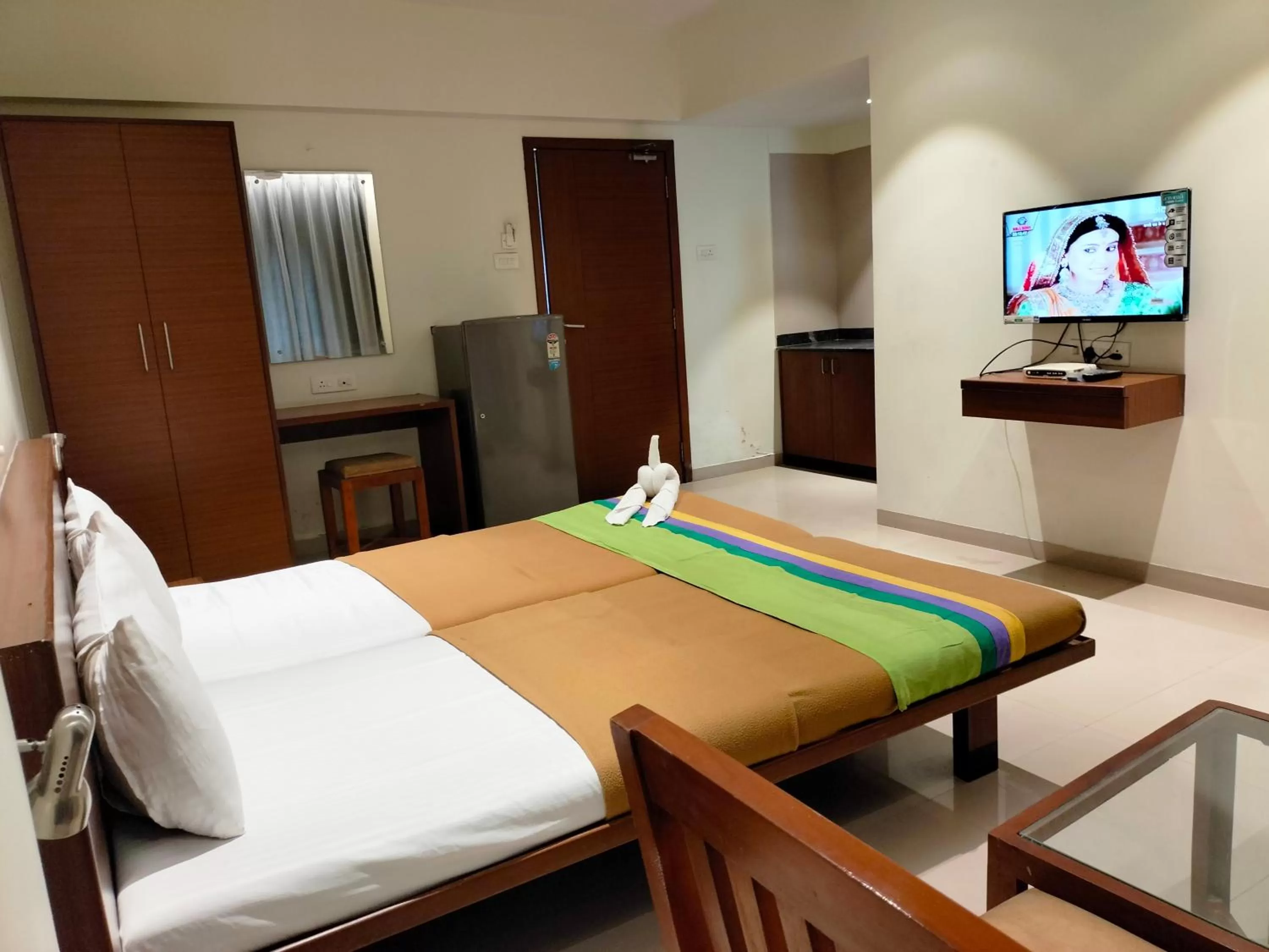 Bed in Hotel Sumanchandra Suites