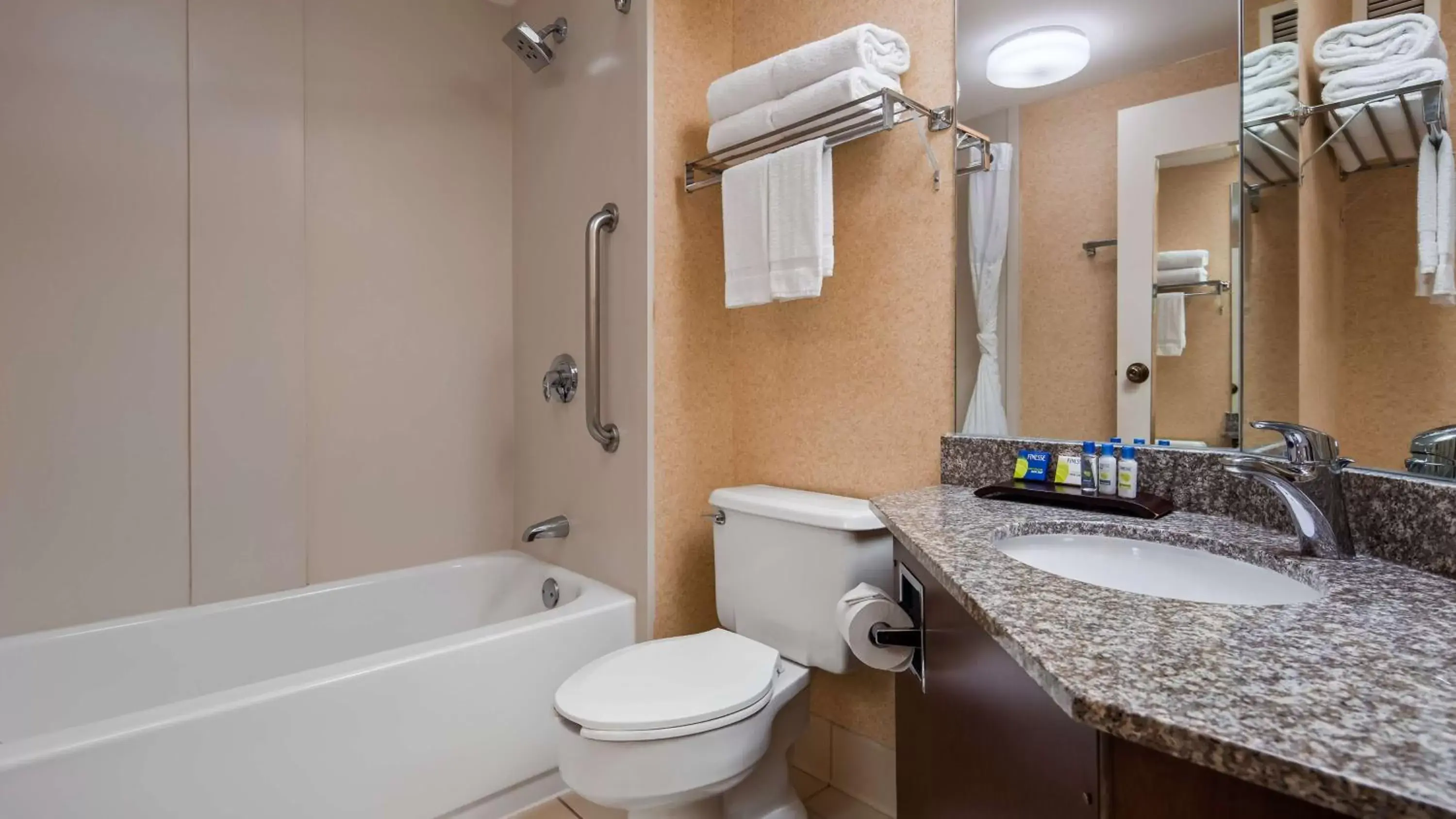 Bathroom in SureStay Plus Hotel by Best Western Chicago Lombard