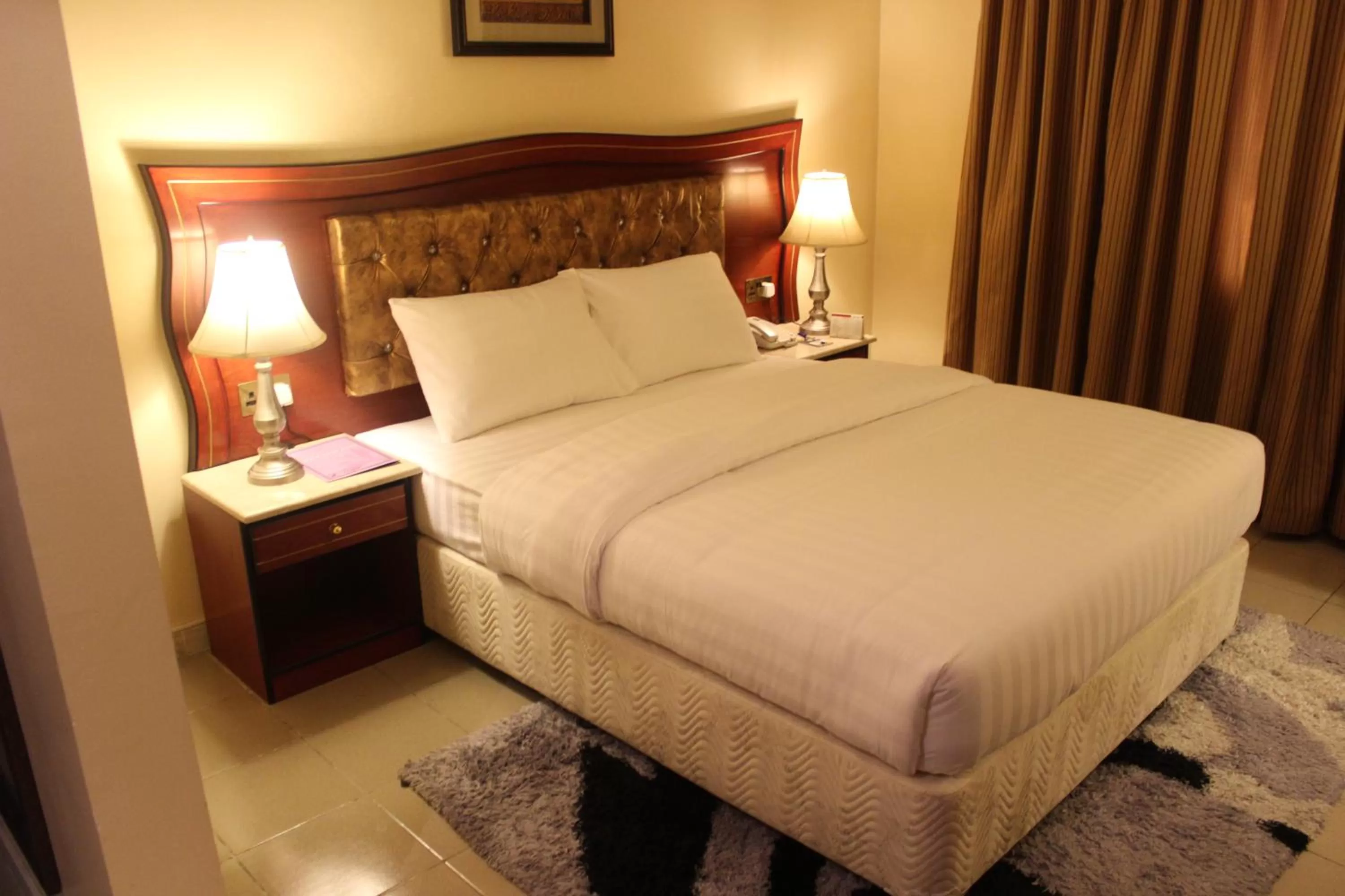 Bed in Saffron Hotel