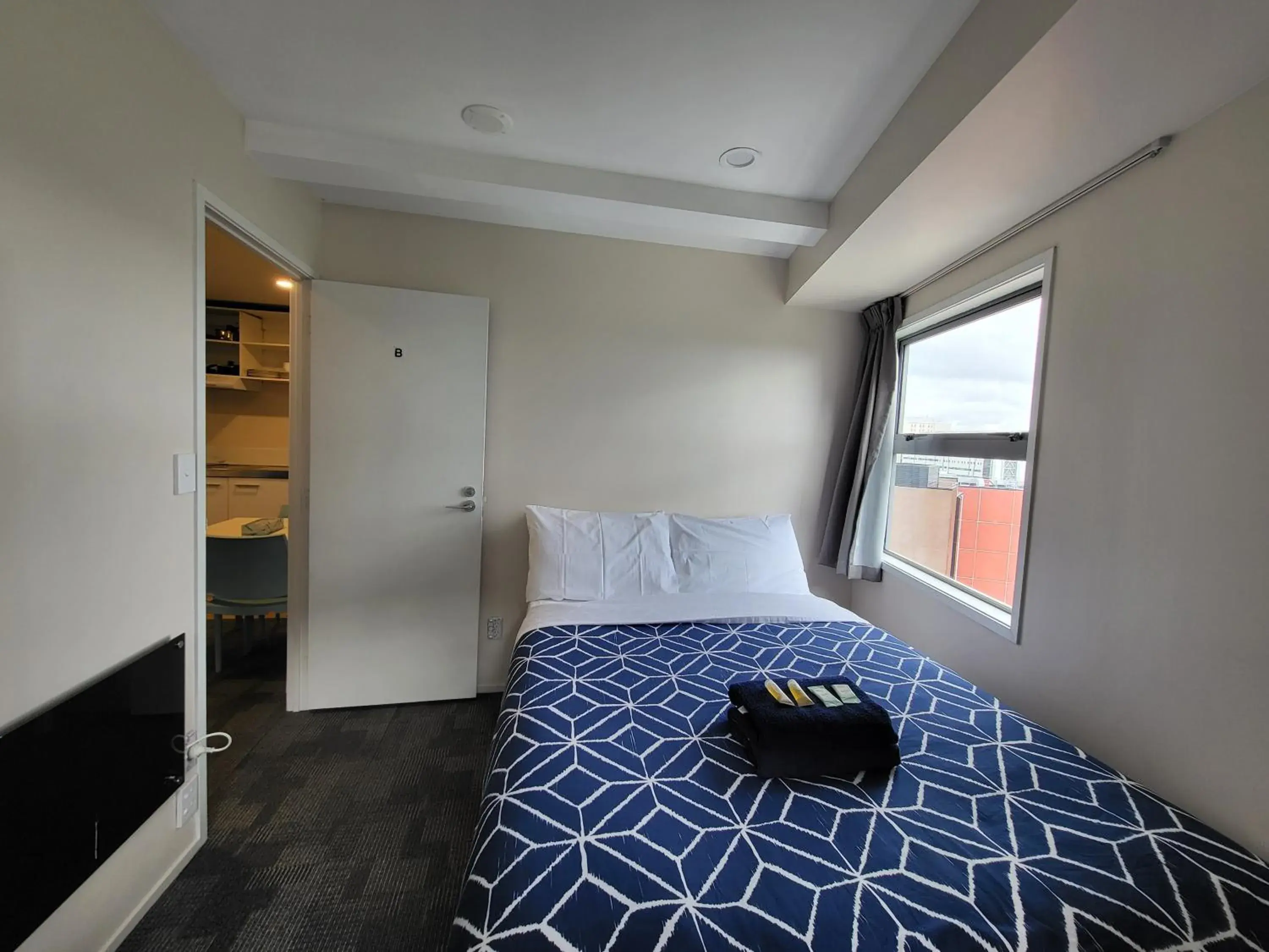 Bed in Empire Apartments Bed in Empire Apartments