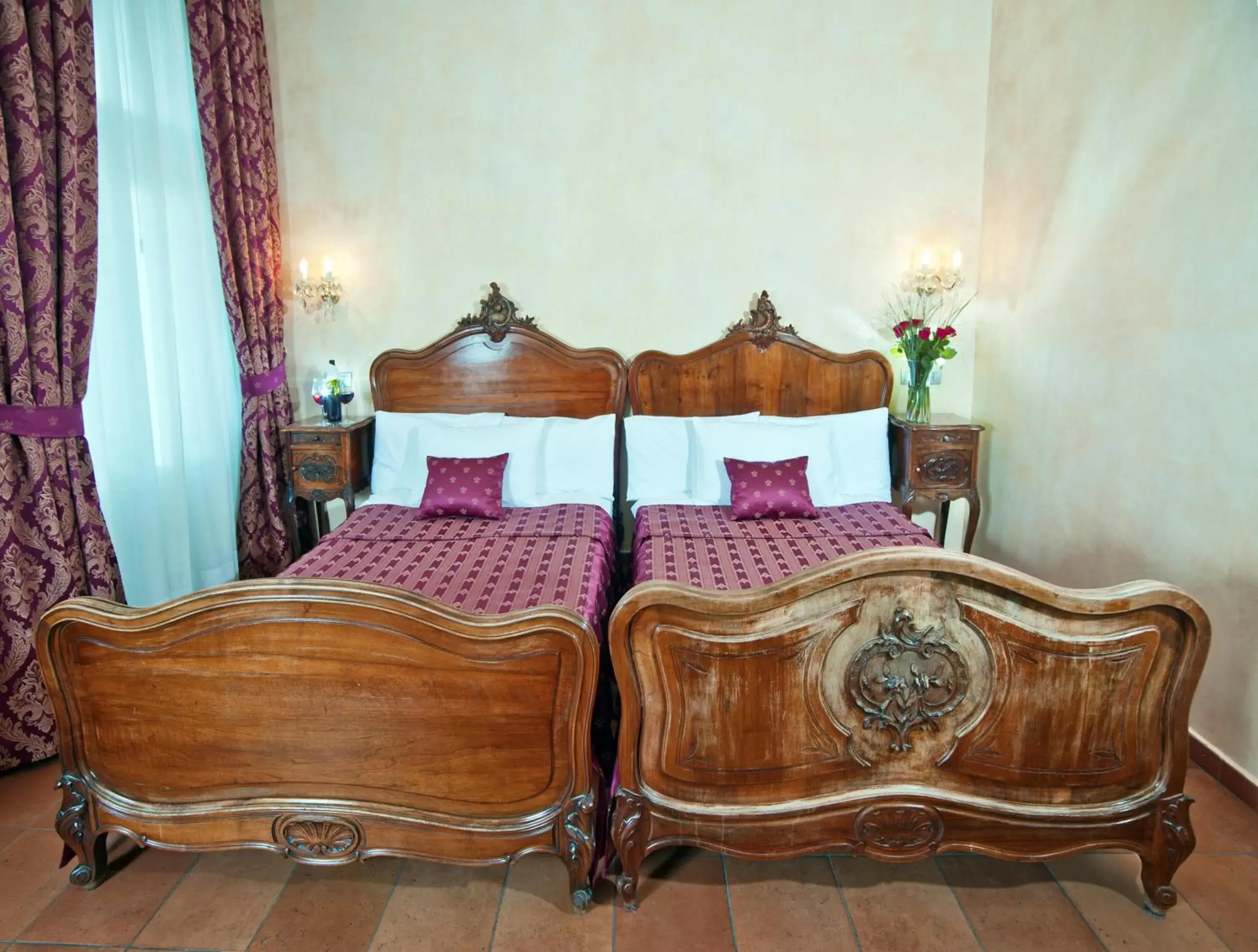 Bed in Hotel Caesar Prague