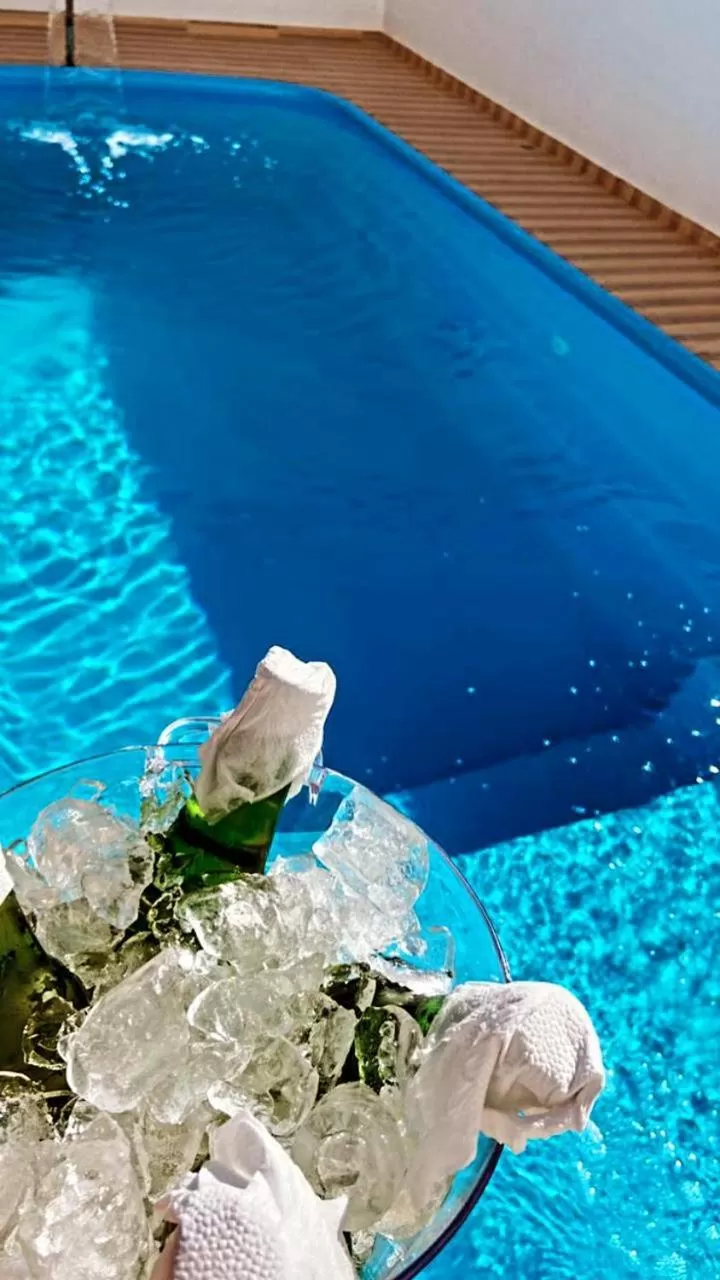 Swimming pool in Pousada Praia Bela