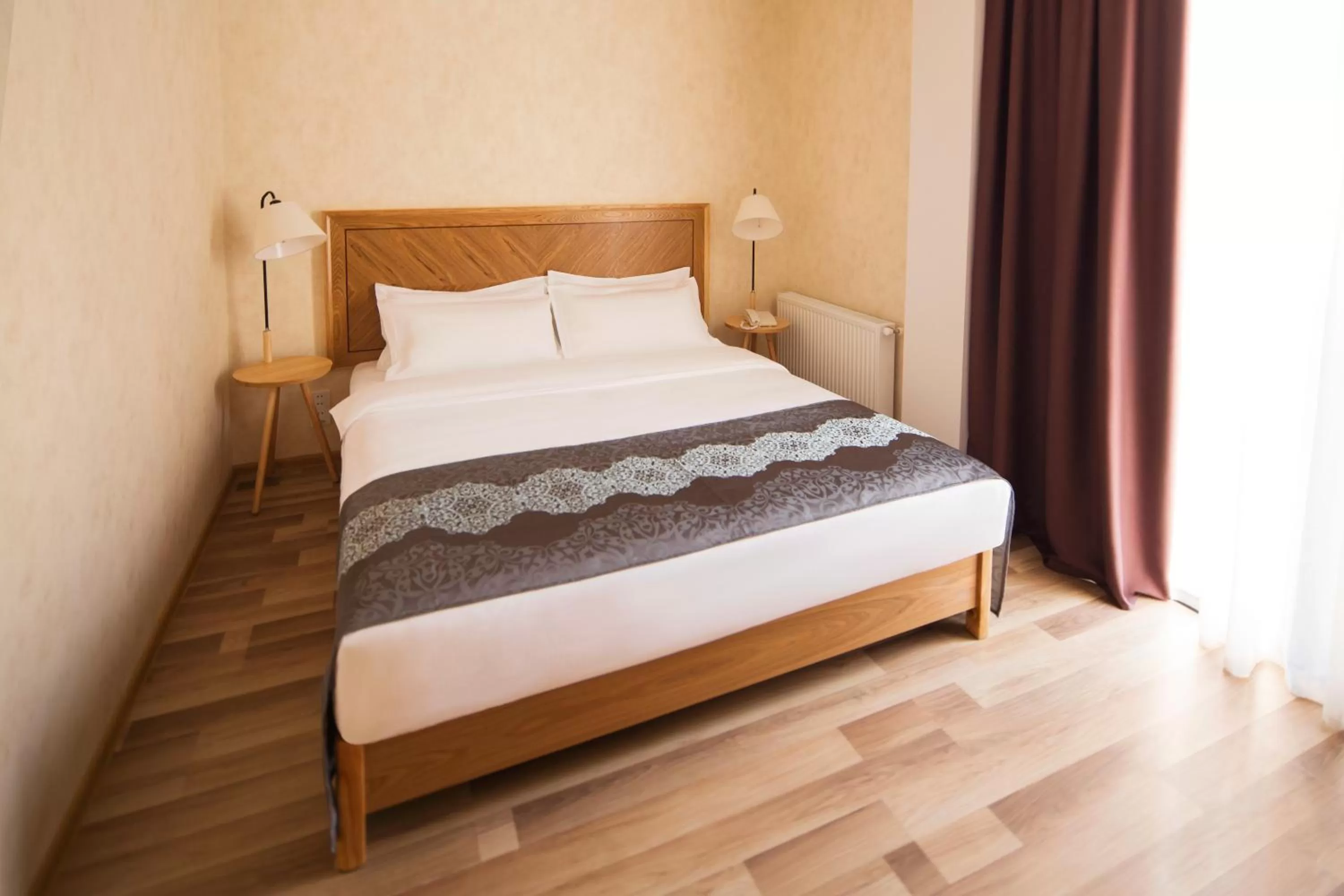 Bed in Ornament Boutique Hotel