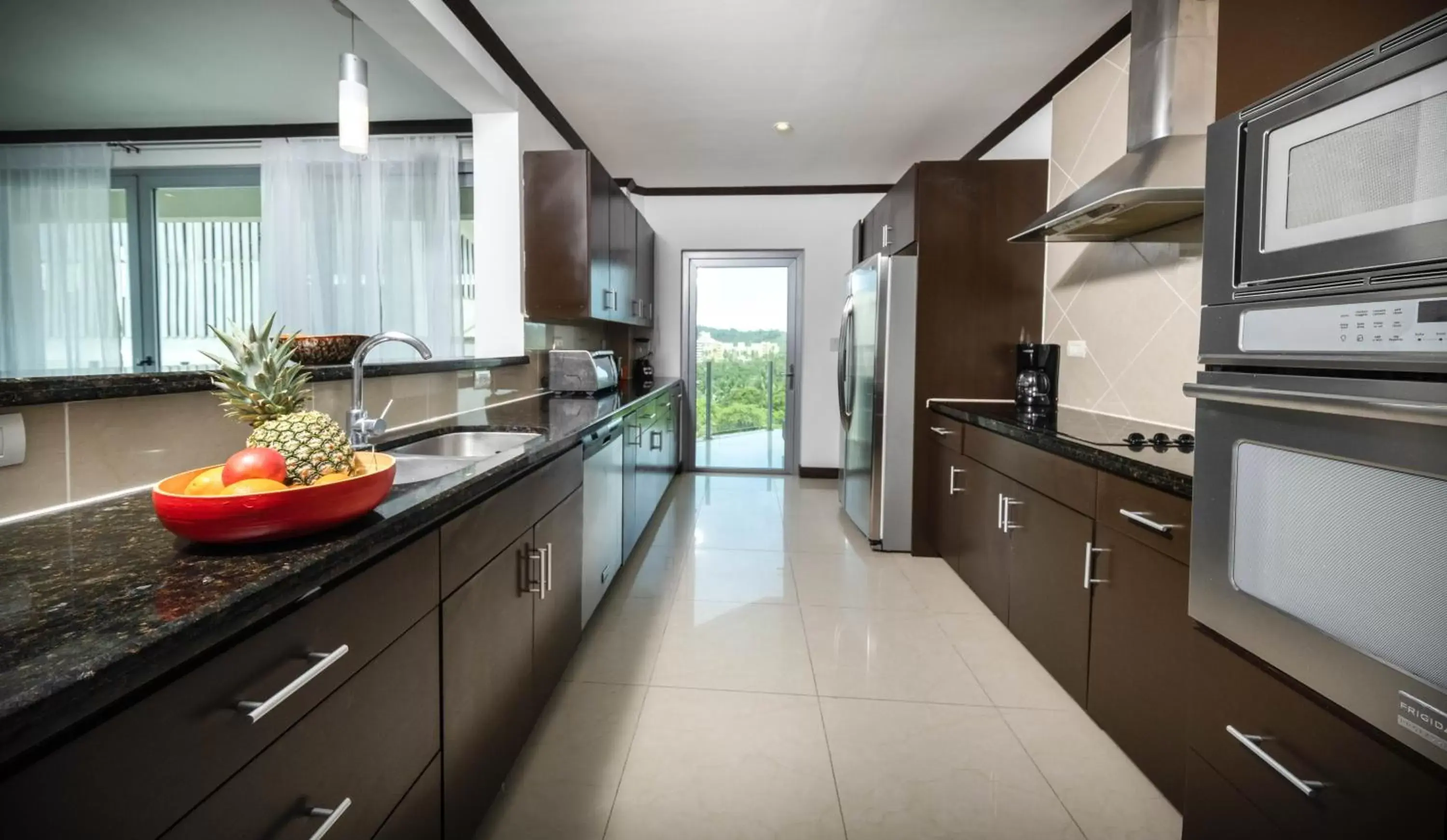 Kitchen/Kitchenette in Best in Jaco Condos at Diamante del Sol