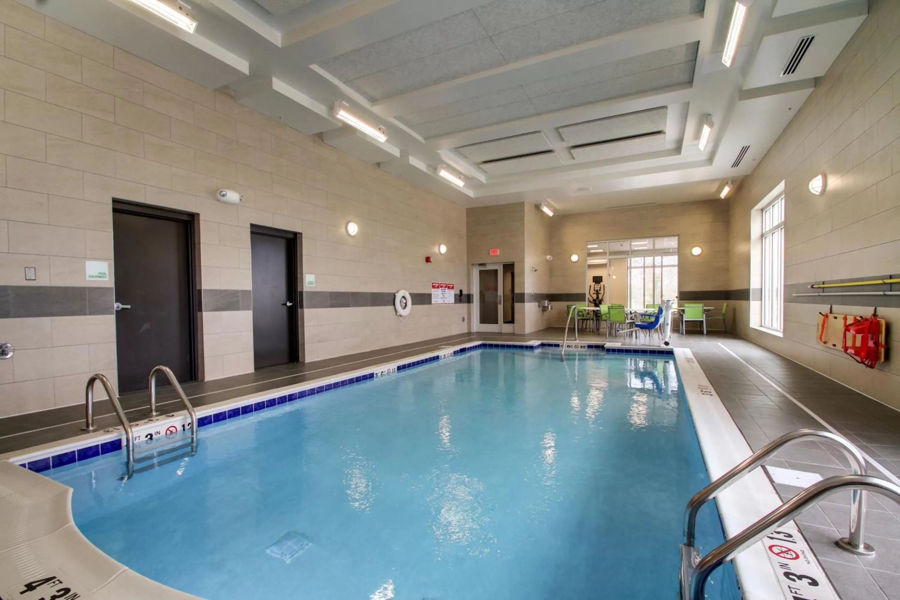Swimming pool in Holiday Inn & Suites Peoria at Grand Prairie by IHG