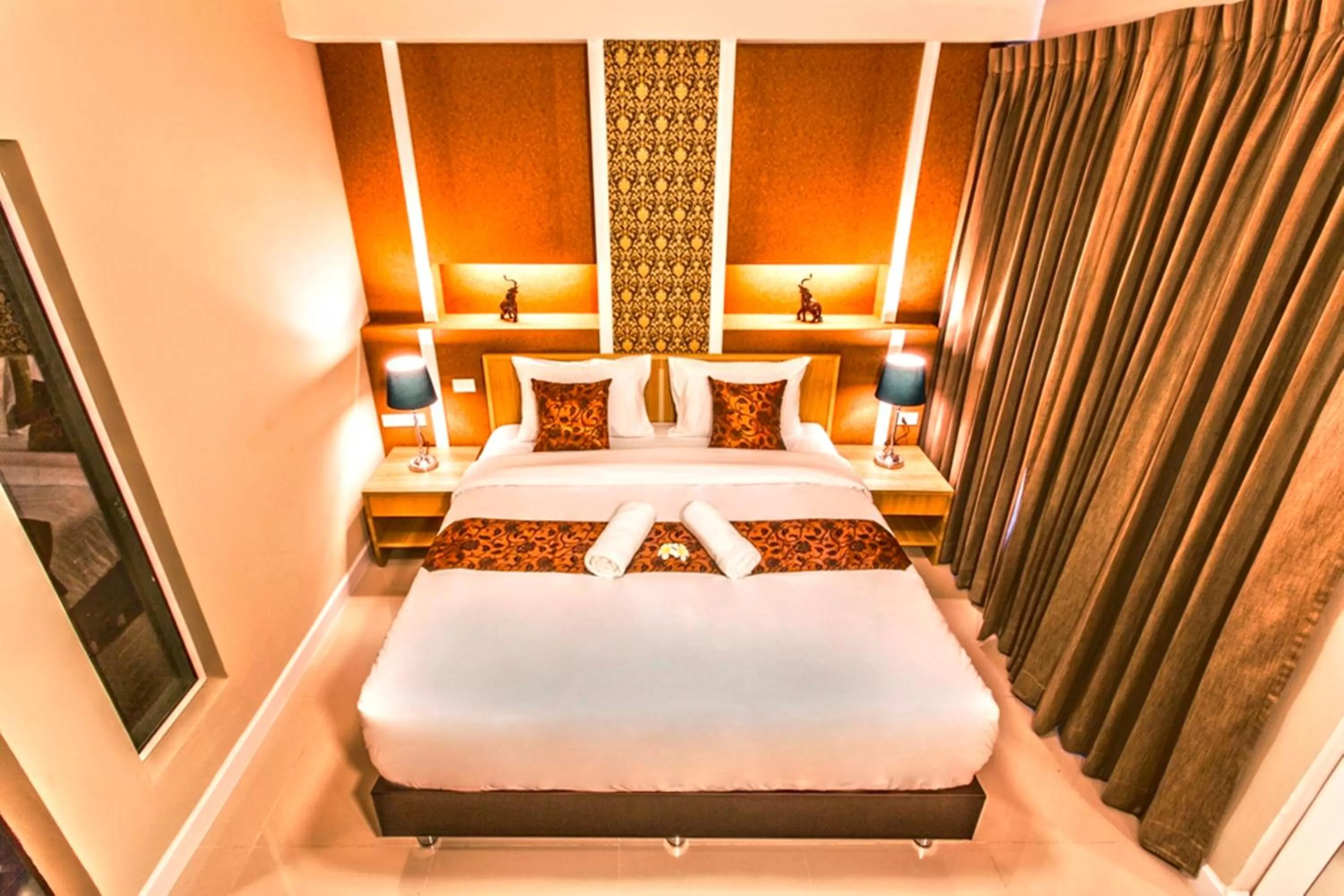 Decorative detail, Bed in The Aim Sathorn Hotel