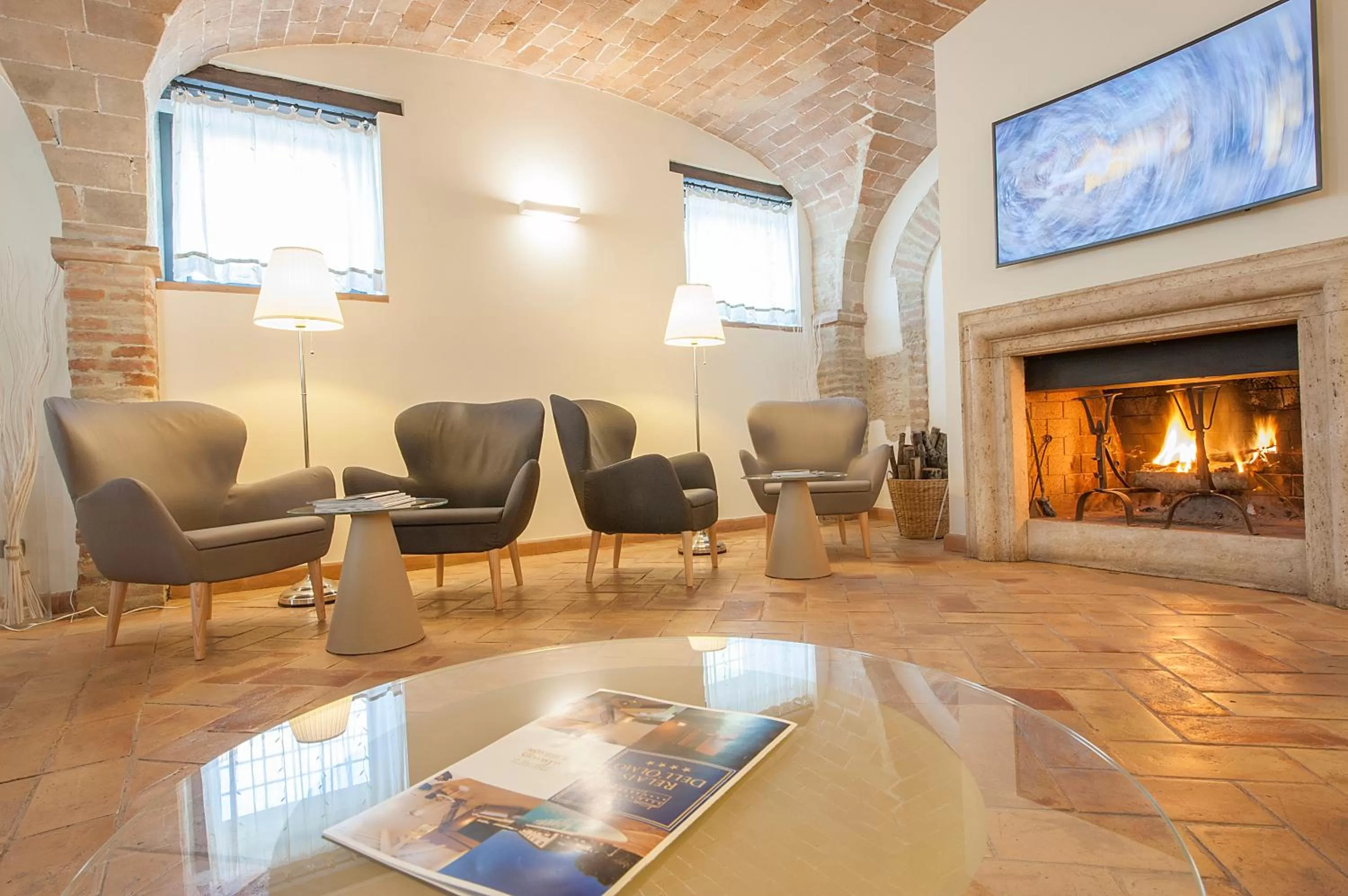 Communal lounge/ TV room in Relais dell'Olmo