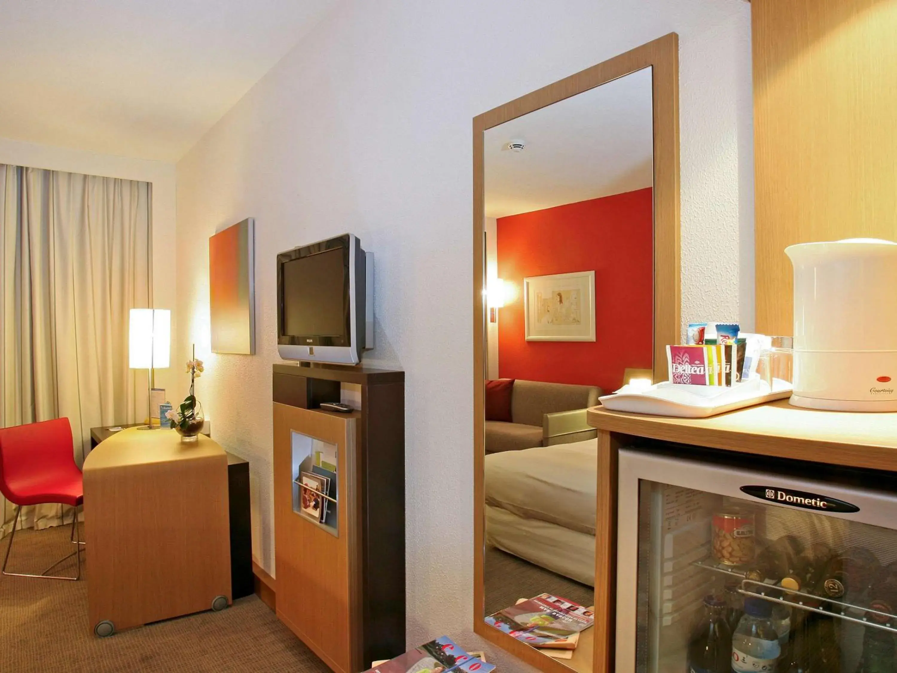 Photo of the whole room, TV/Entertainment Center in Novotel Porto Gaia