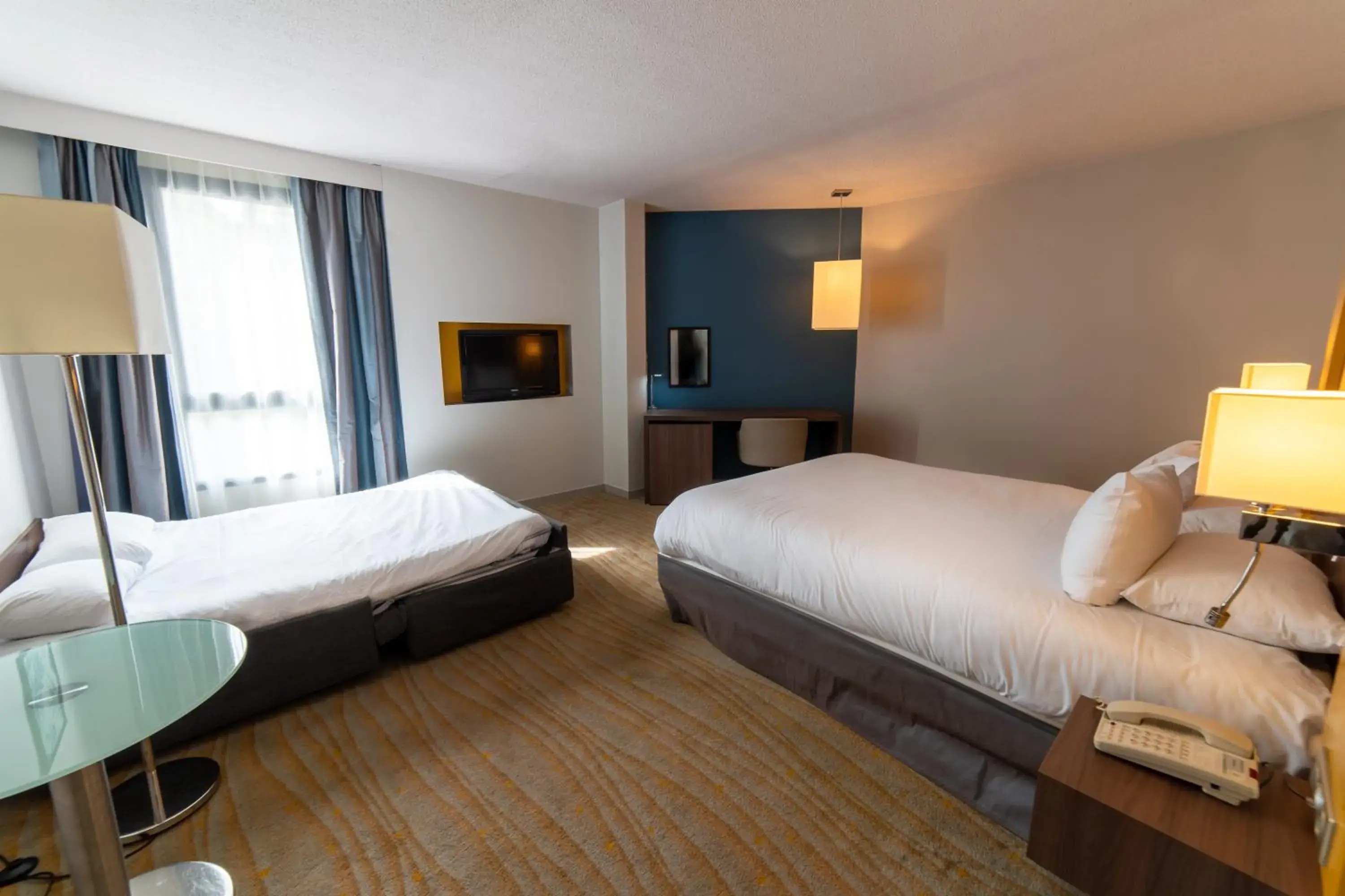 Bed in Holiday Inn Lyon Vaise, an IHG Hotel