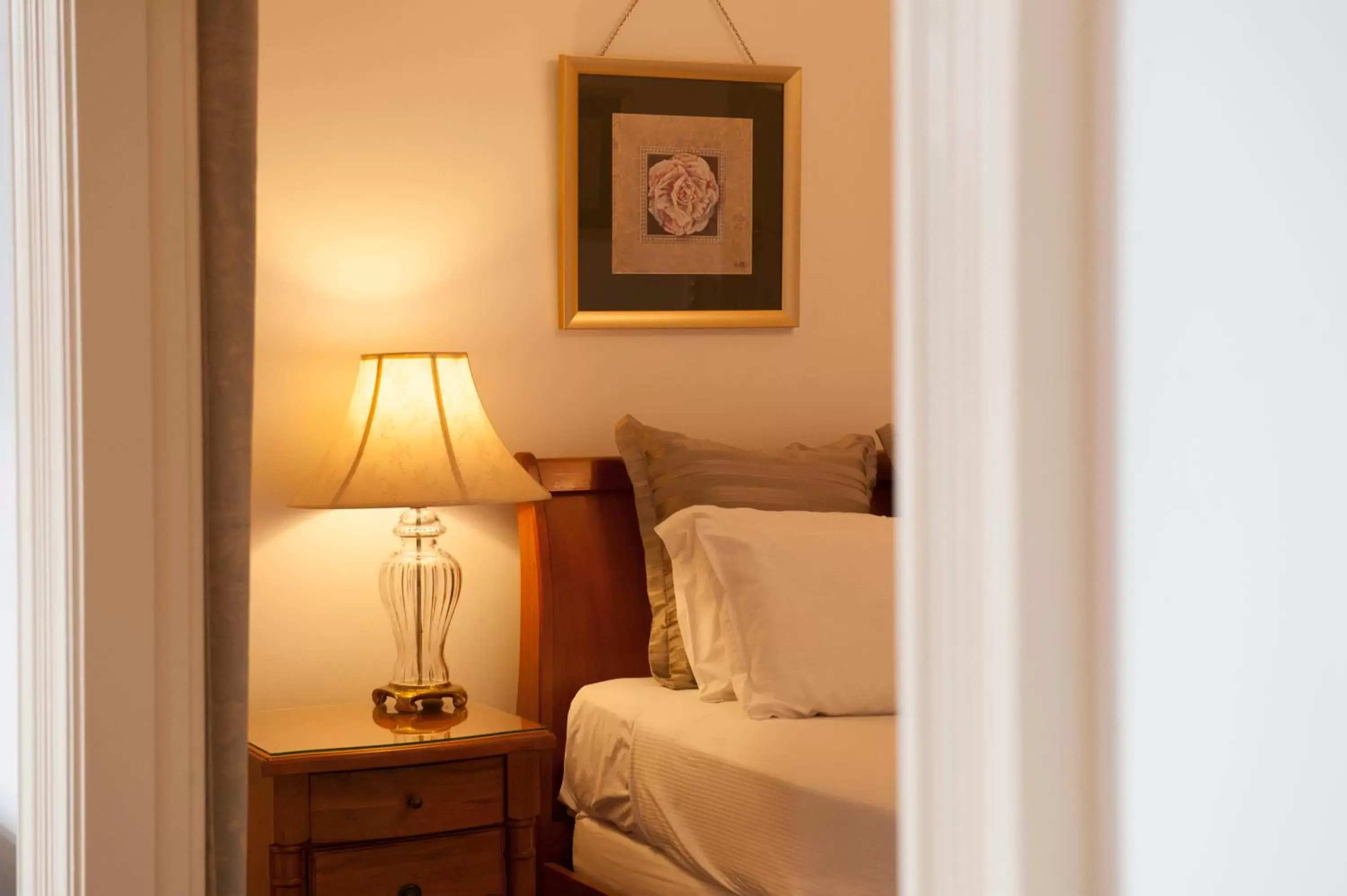 Decorative detail, Bed in Cobb & Co Court Boutique Hotel