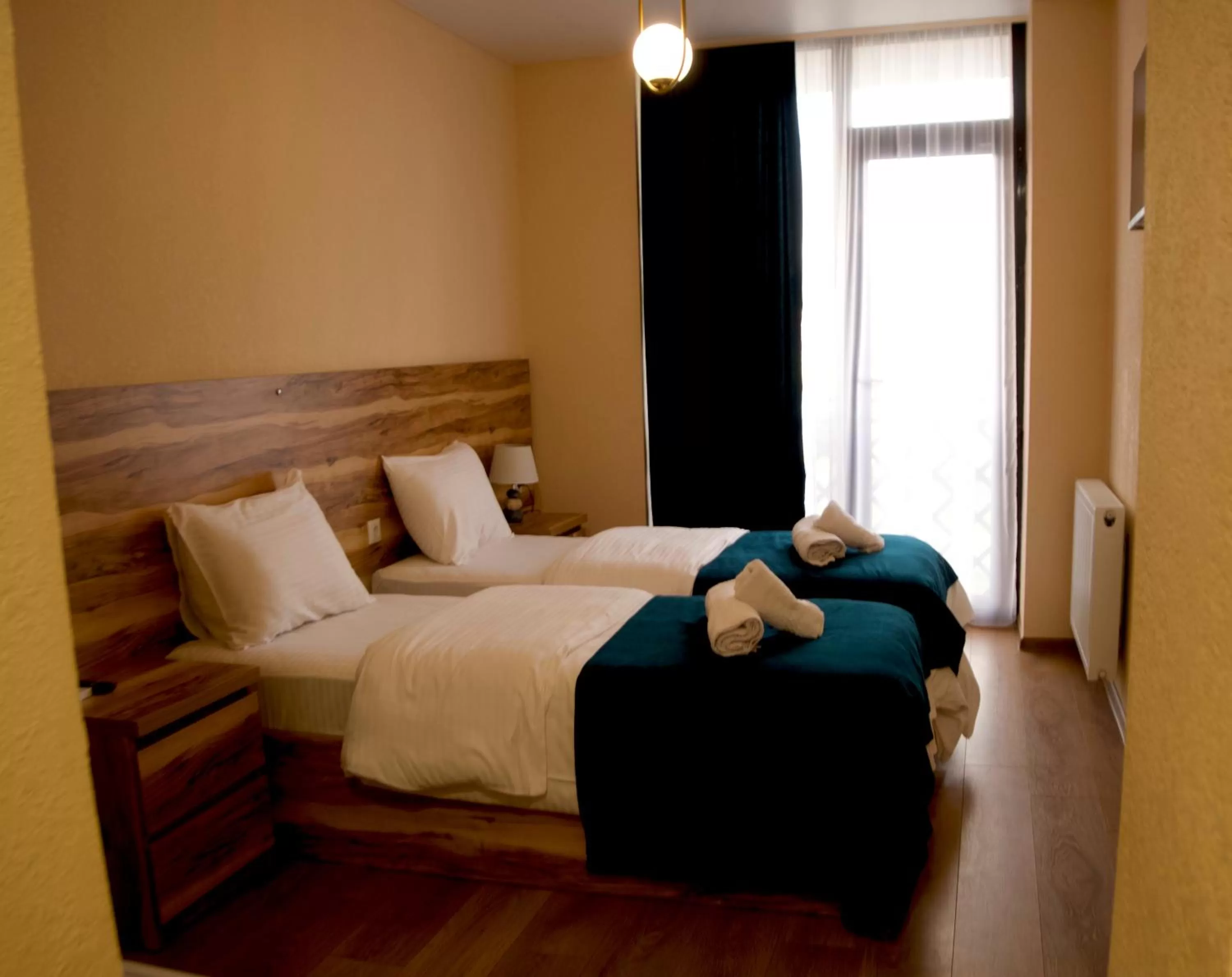 Bed in Bessarion Boutique Hotel