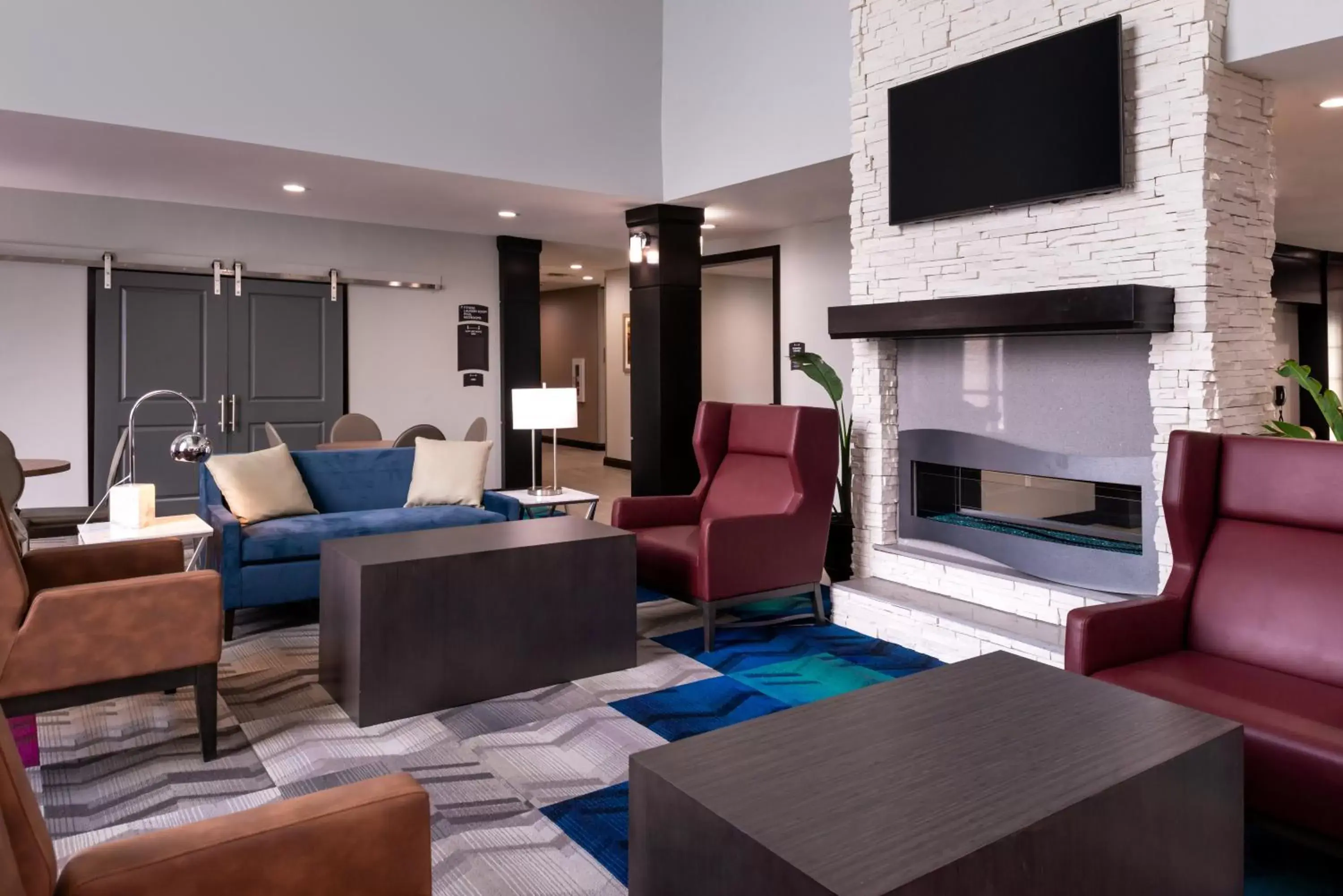 Lobby or reception, Seating Area in Staybridge Suites - Lake Charles, an IHG Hotel