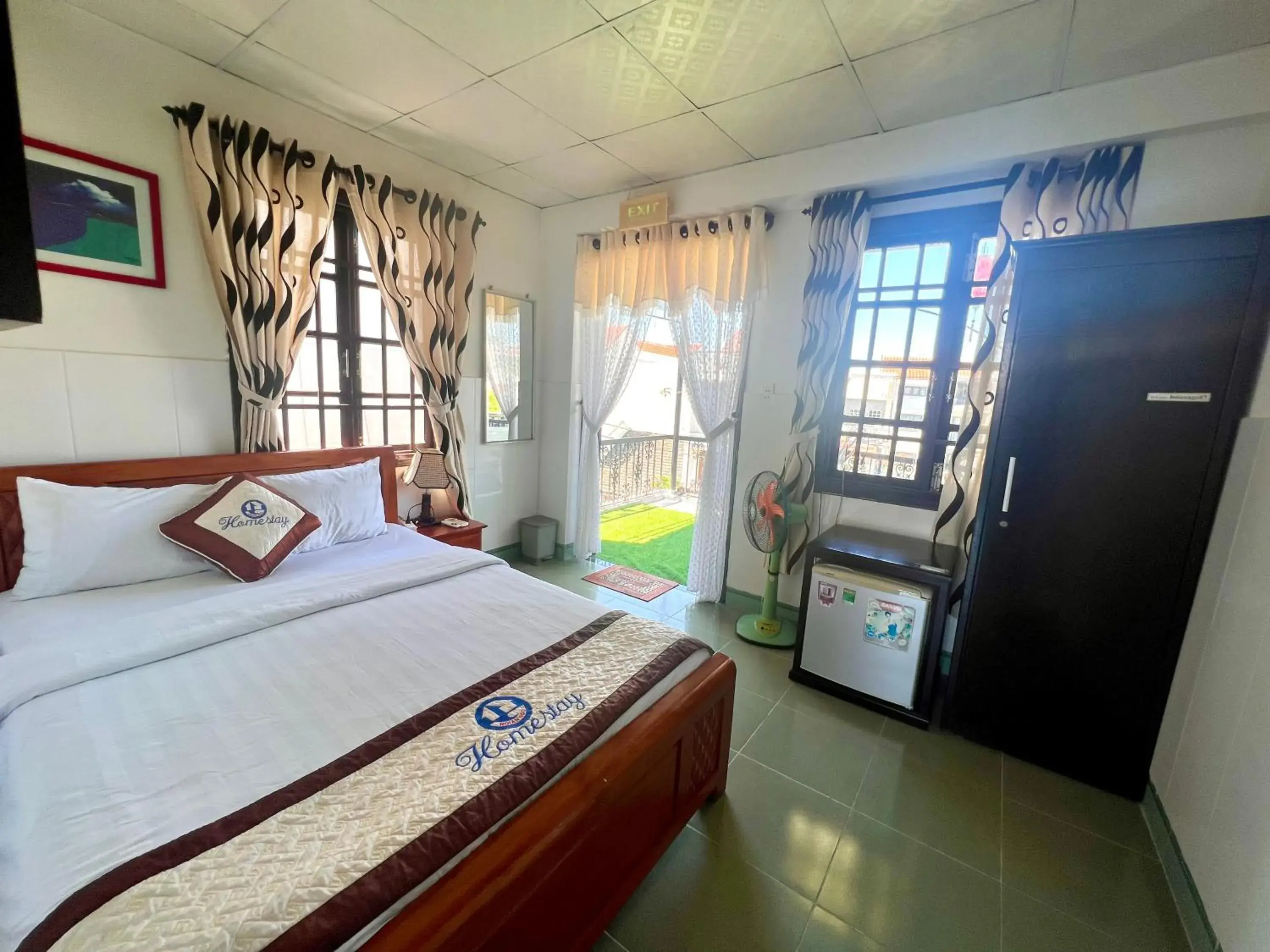Photo of the whole room, Bed in Hoi An Ngo Homestay