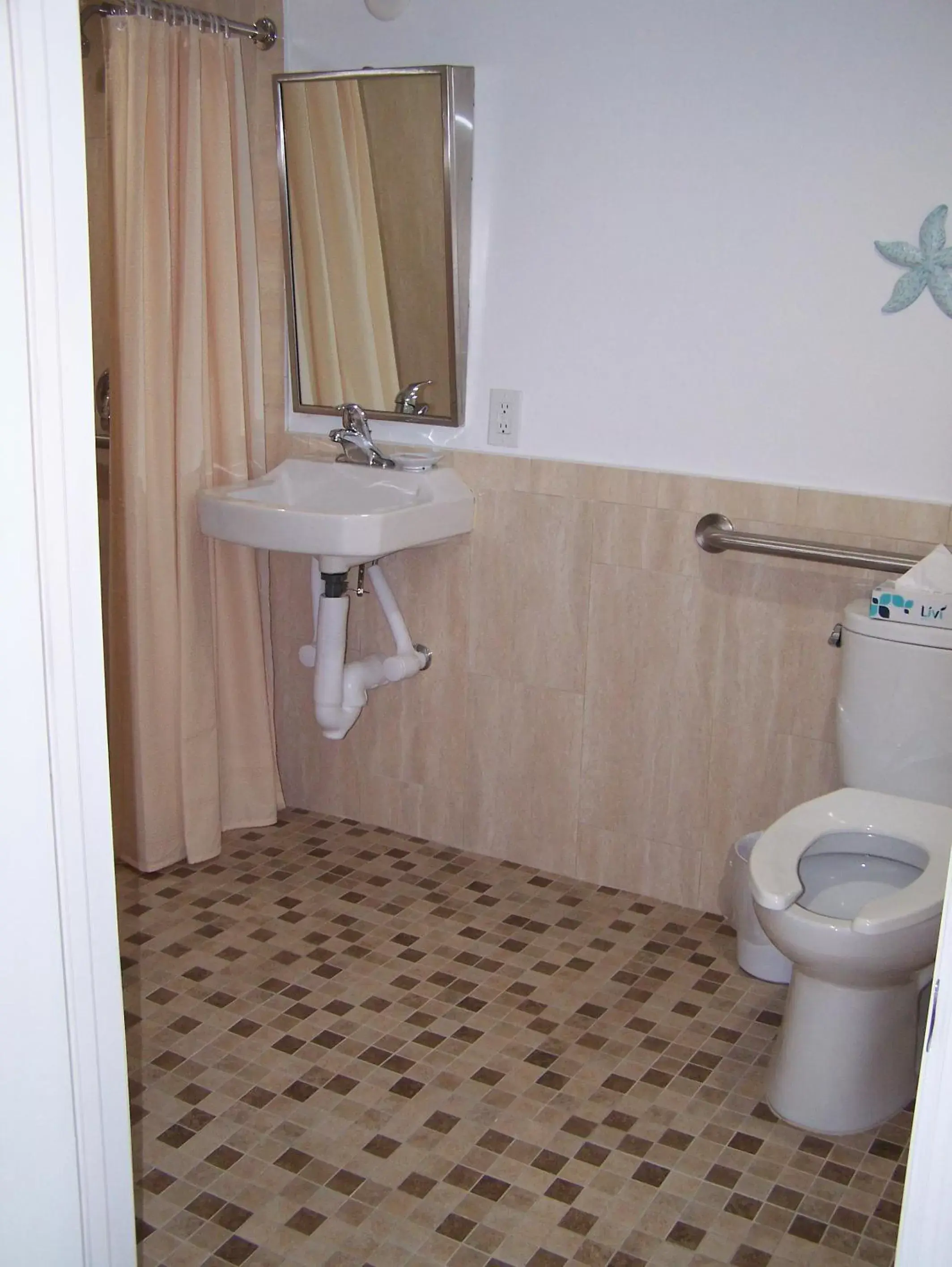 Toilet, Bathroom in Rock Reef Resort