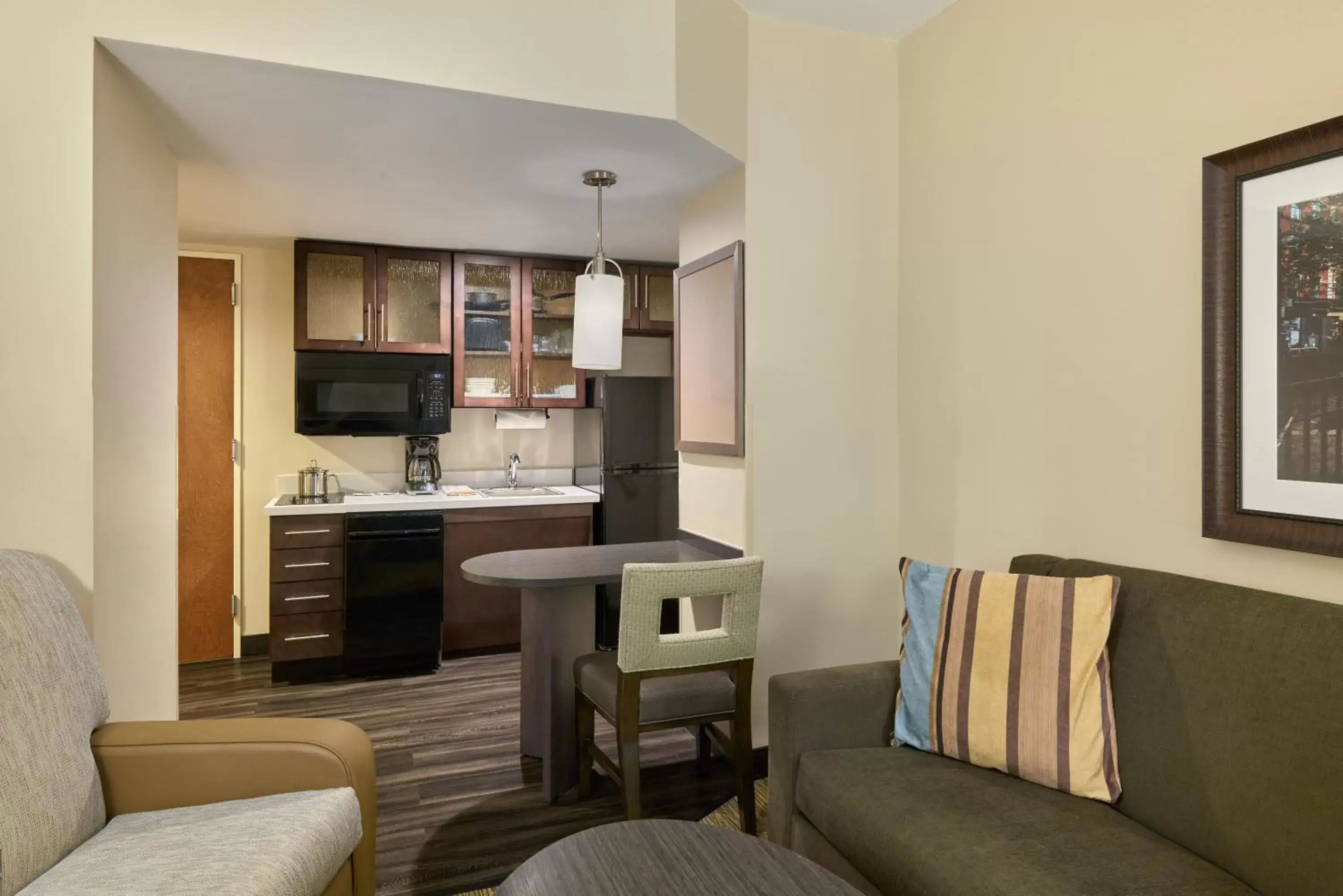 Kitchen or kitchenette, Seating Area in Candlewood Suites NYC -Times Square, an IHG Hotel