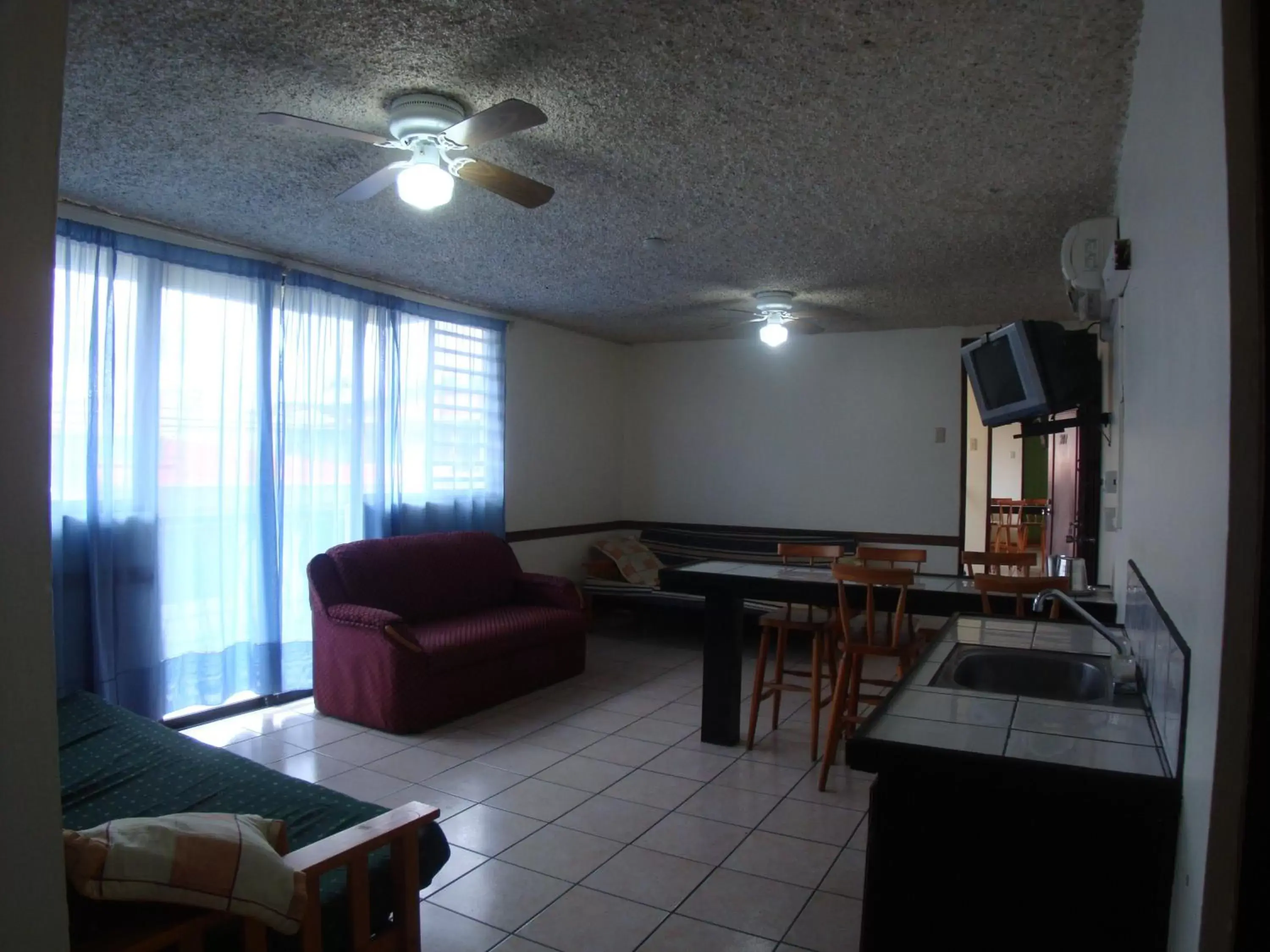 Living room, Seating Area in Hotel La Guaria Inn & Suites