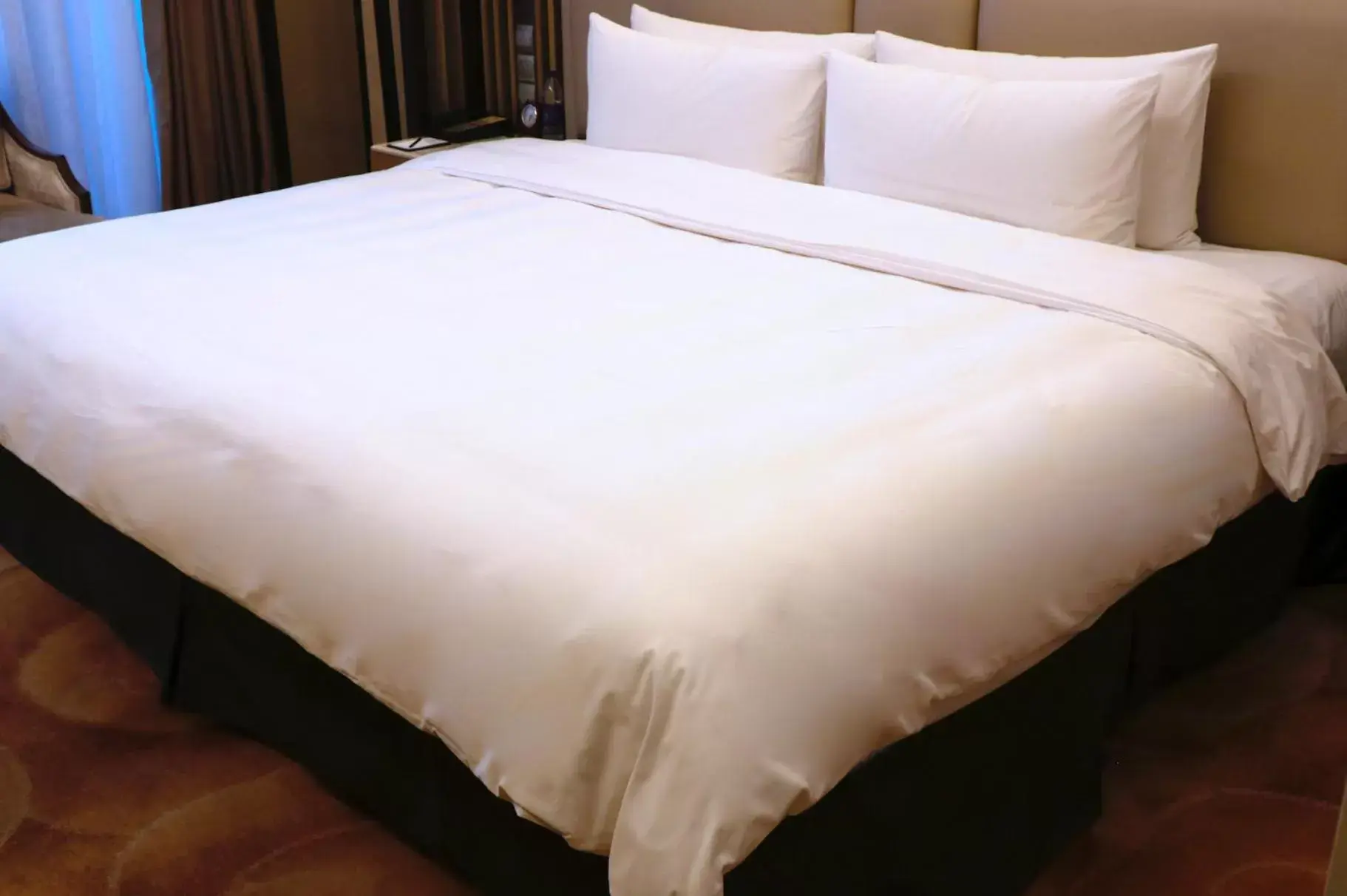 Bed in Shangri-La Qufu Bed in Shangri-La Qufu