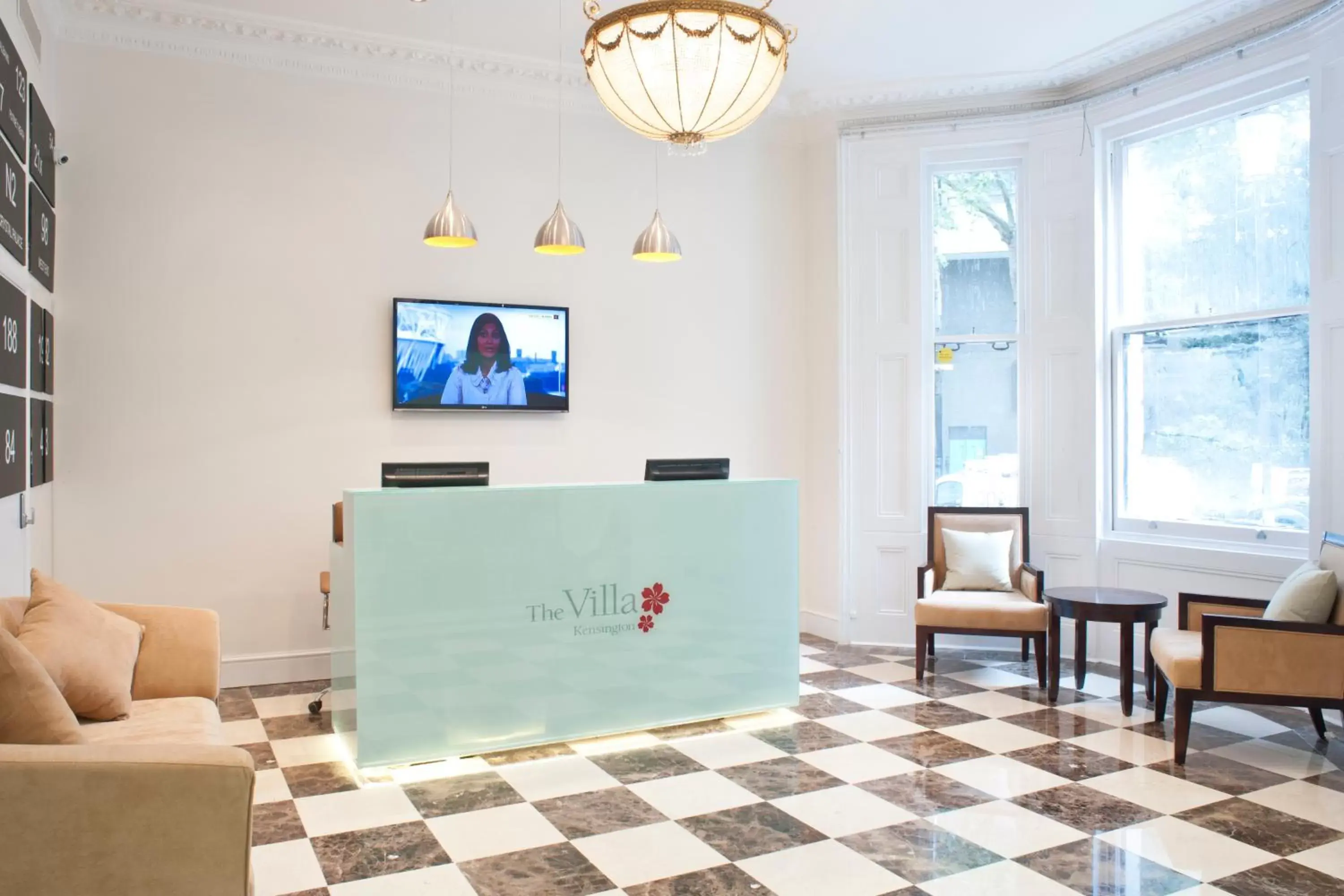 Lobby or reception, TV/Entertainment Center in The Villa Kensington