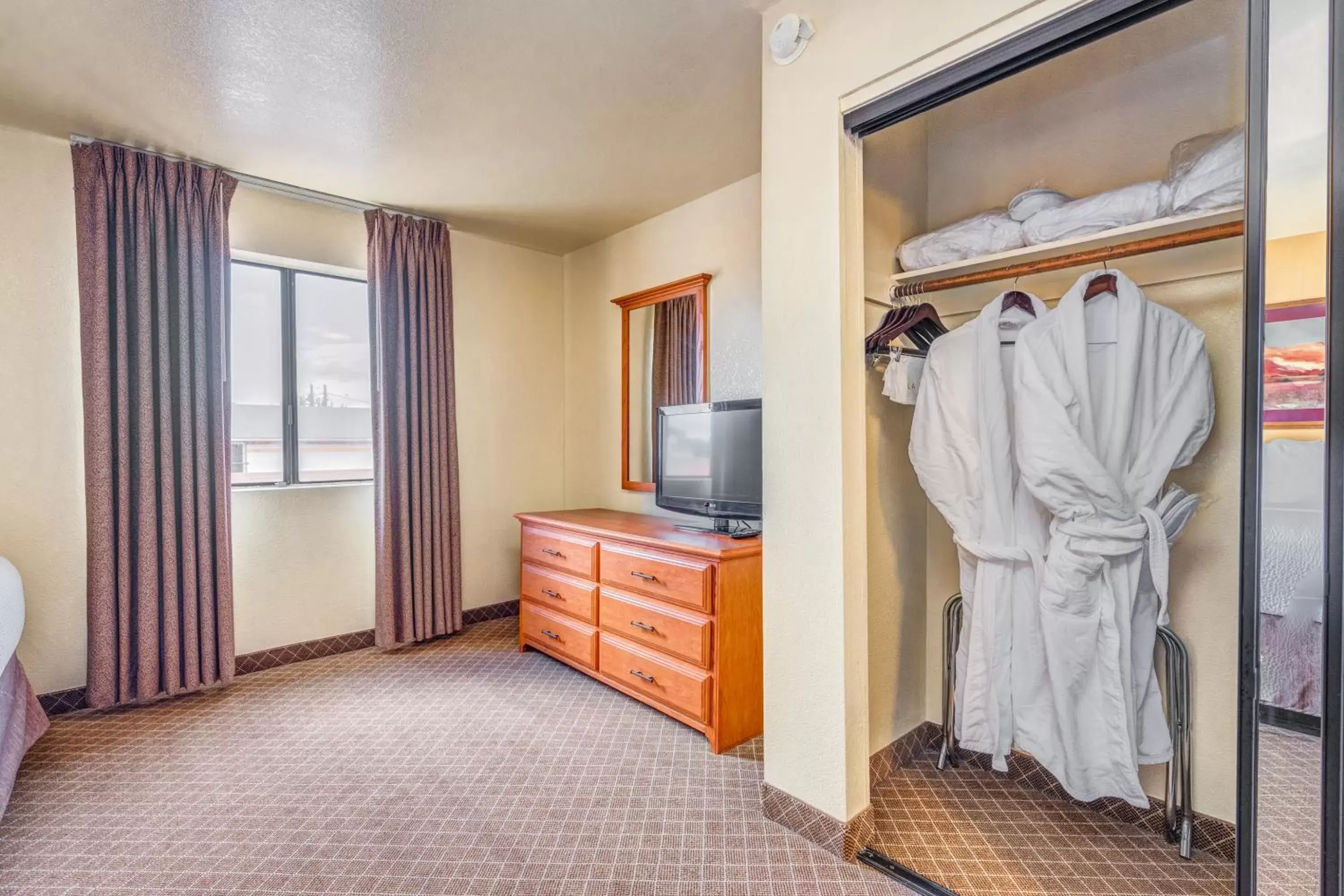 Bedroom in Sierra Suites Boutique Hotel