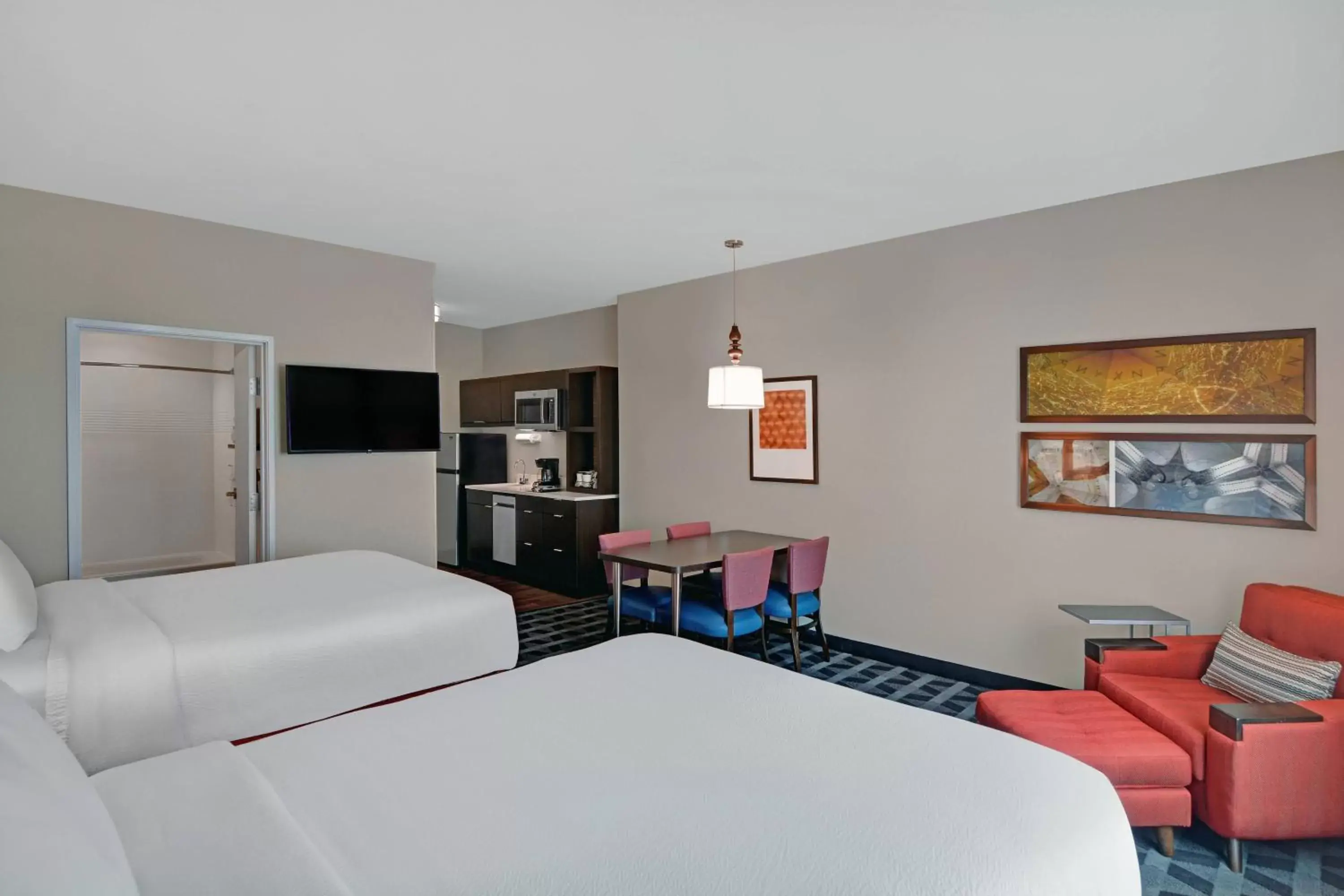 Living room, Bed in TownePlace Suites by Marriott Indianapolis Downtown