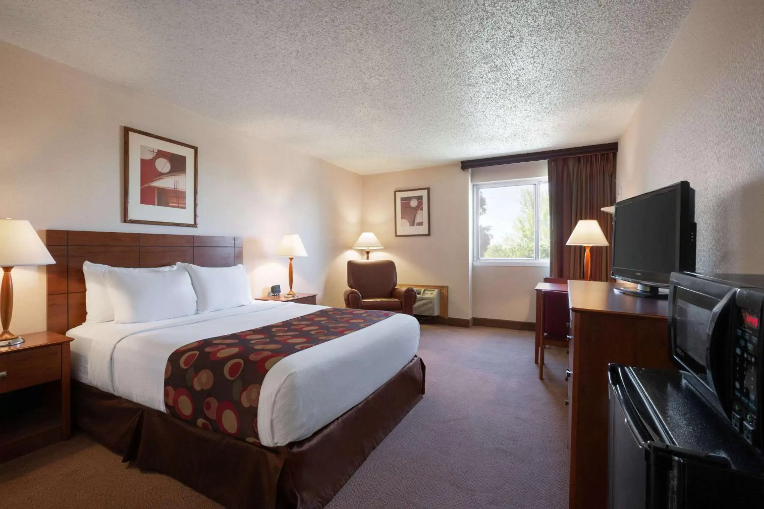 Photo of the whole room, Bed in Ramada by Wyndham Bismarck