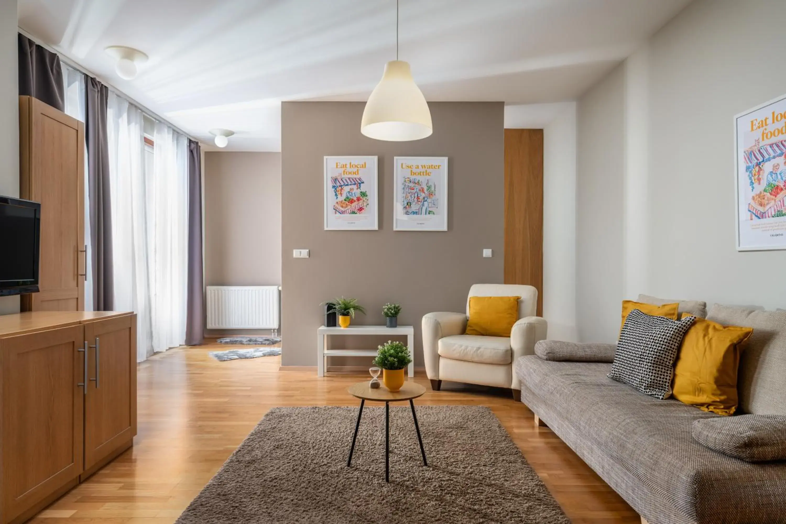 TV and multimedia, Seating Area in Central Passage Budapest Apartments