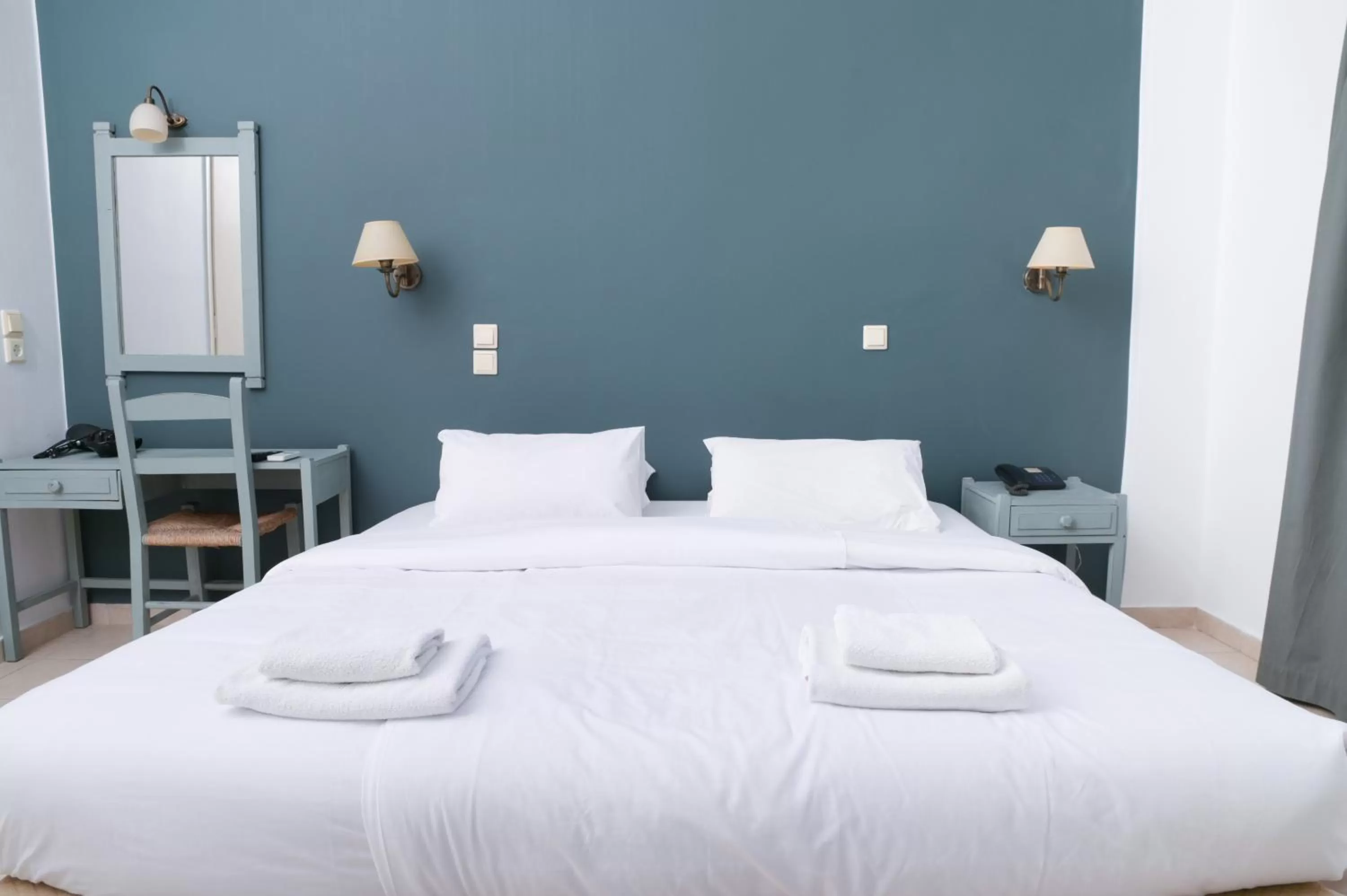 Bed in Ikaros Art Hotel