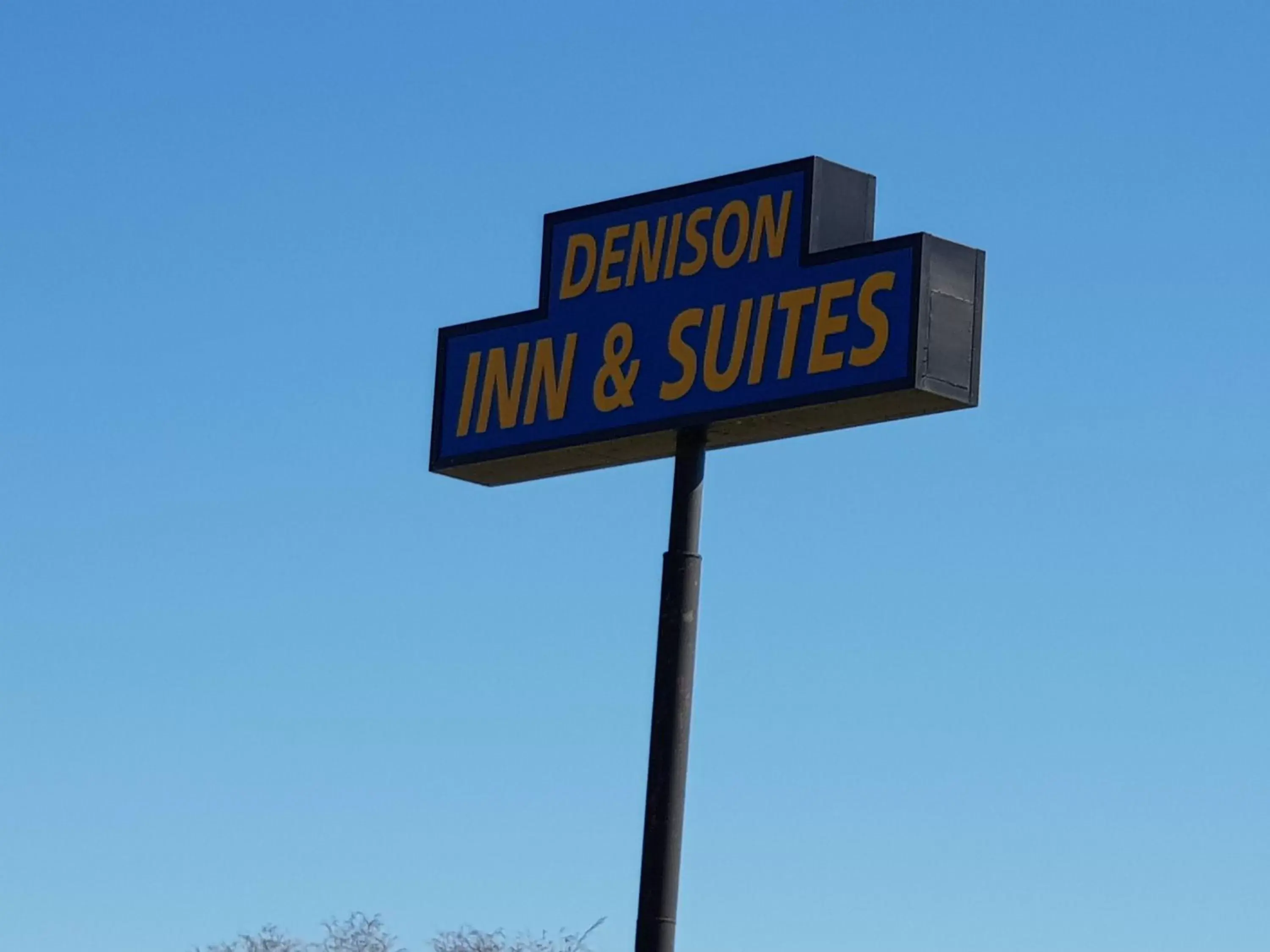 Property logo or sign in Denison Inn & Suites