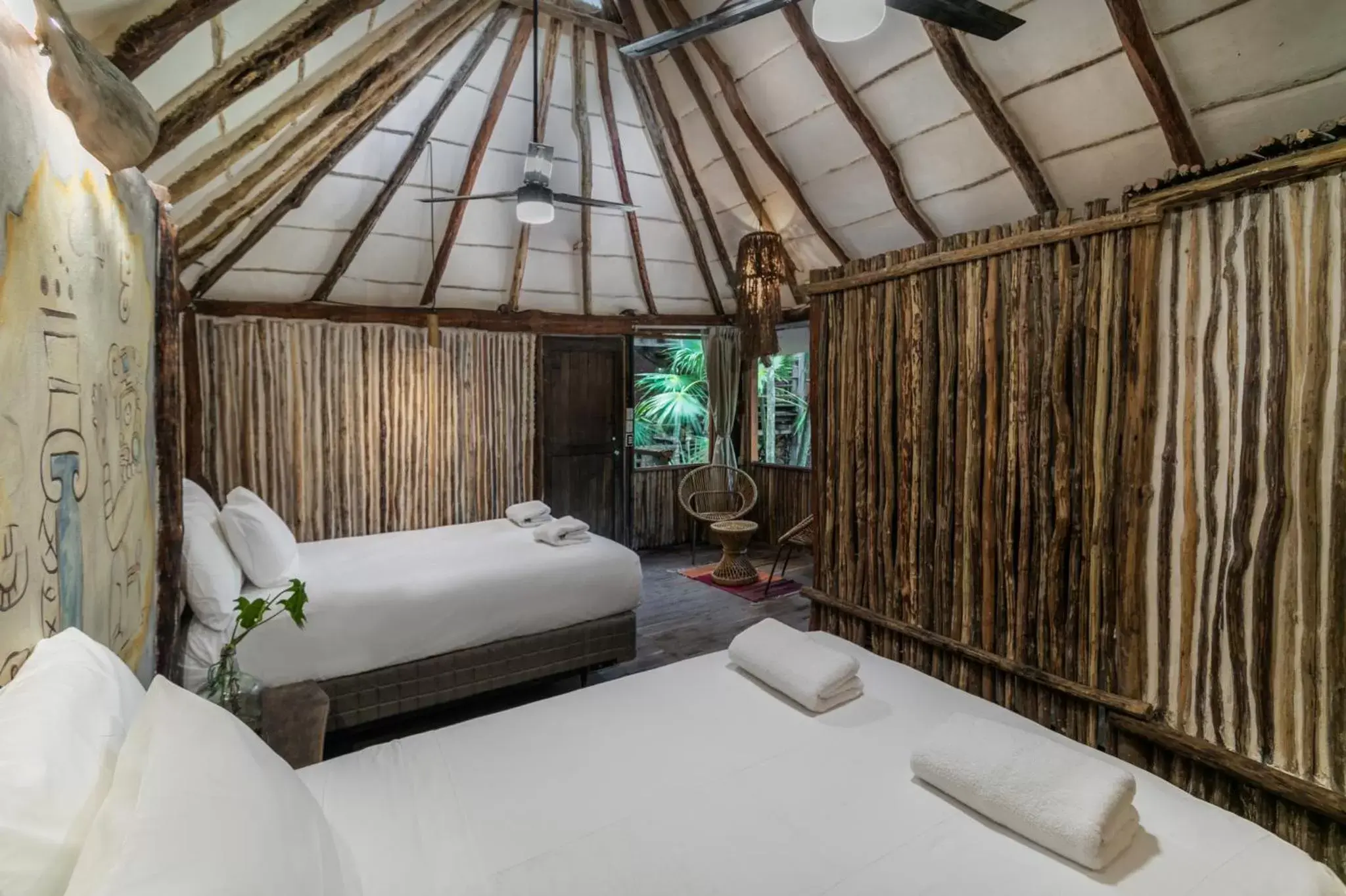 Bed in Hidden Treehouse Tulum Eco-Hotel