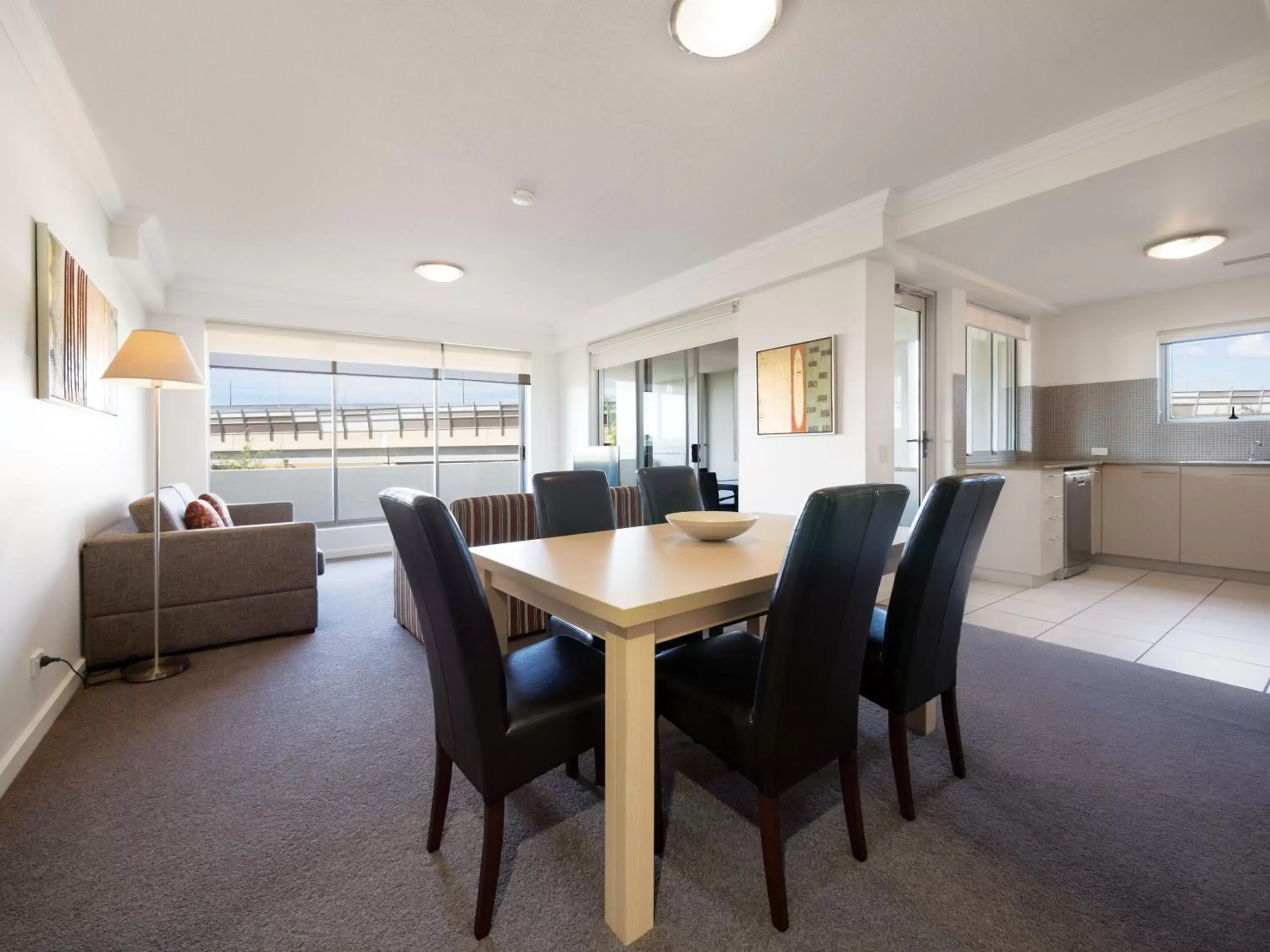 Living room, Dining Area in Oaks Brisbane Mews Suites