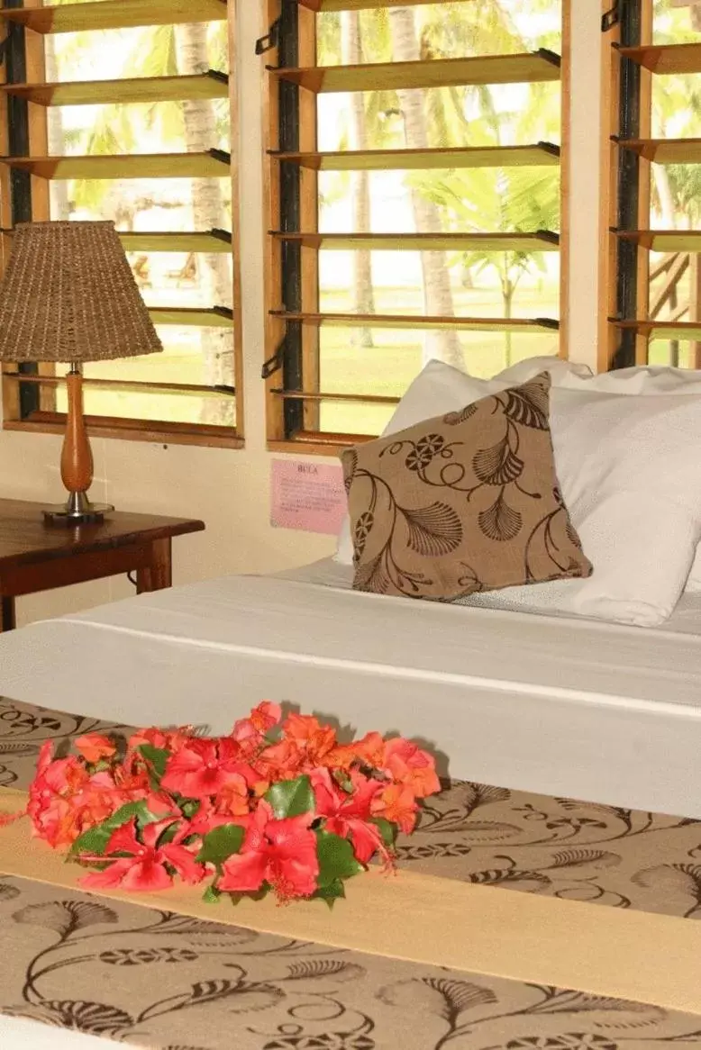 Bed in Club Fiji Resort