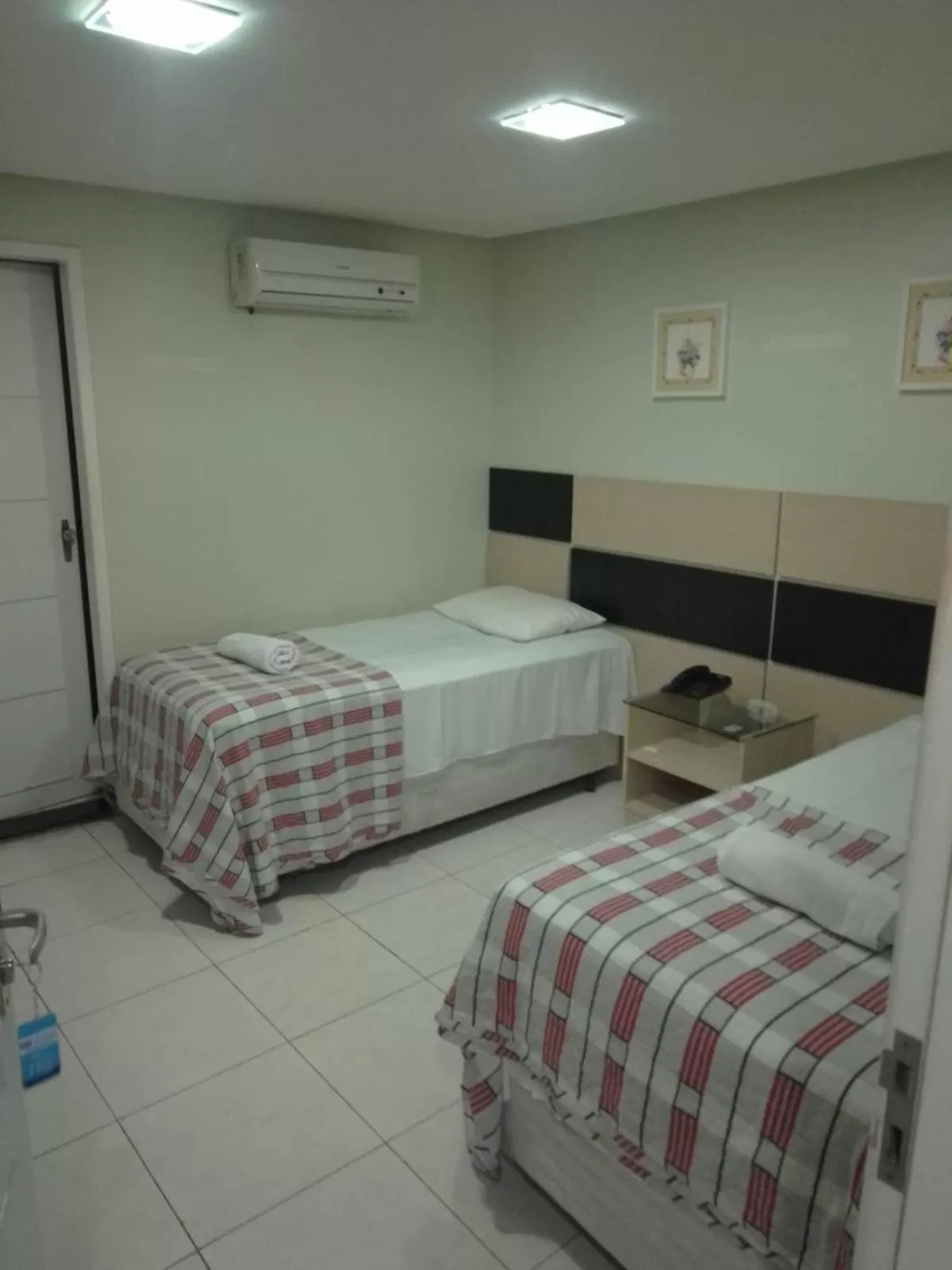 Photo of the whole room, Bed in LW Hotel