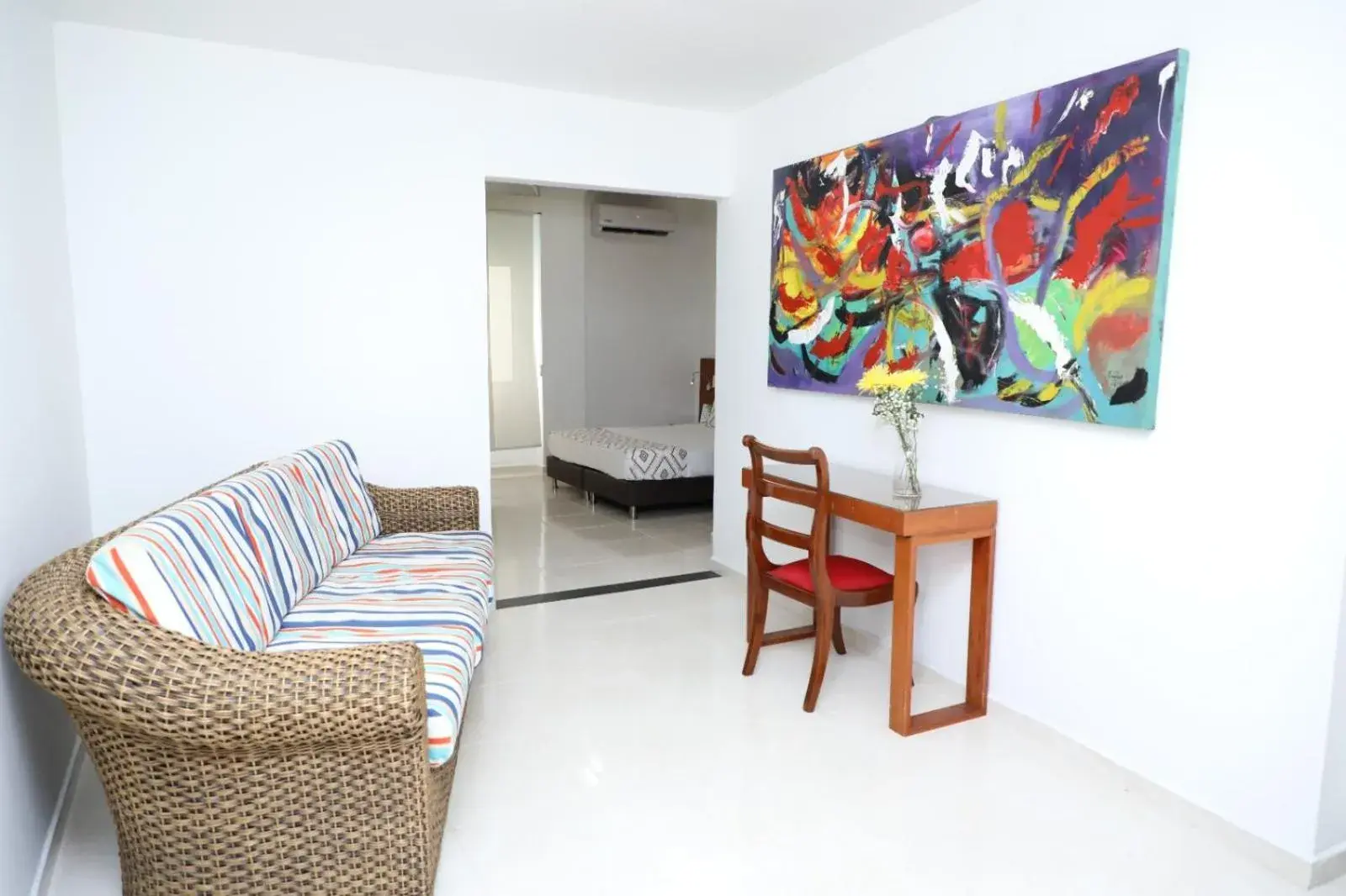 Bed, Seating Area in Hotel Guane