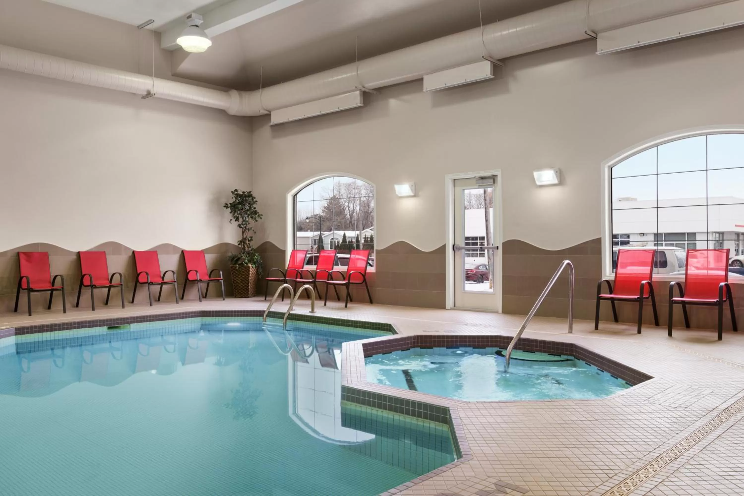 Swimming pool in Days Inn & Suites by Wyndham Brandon