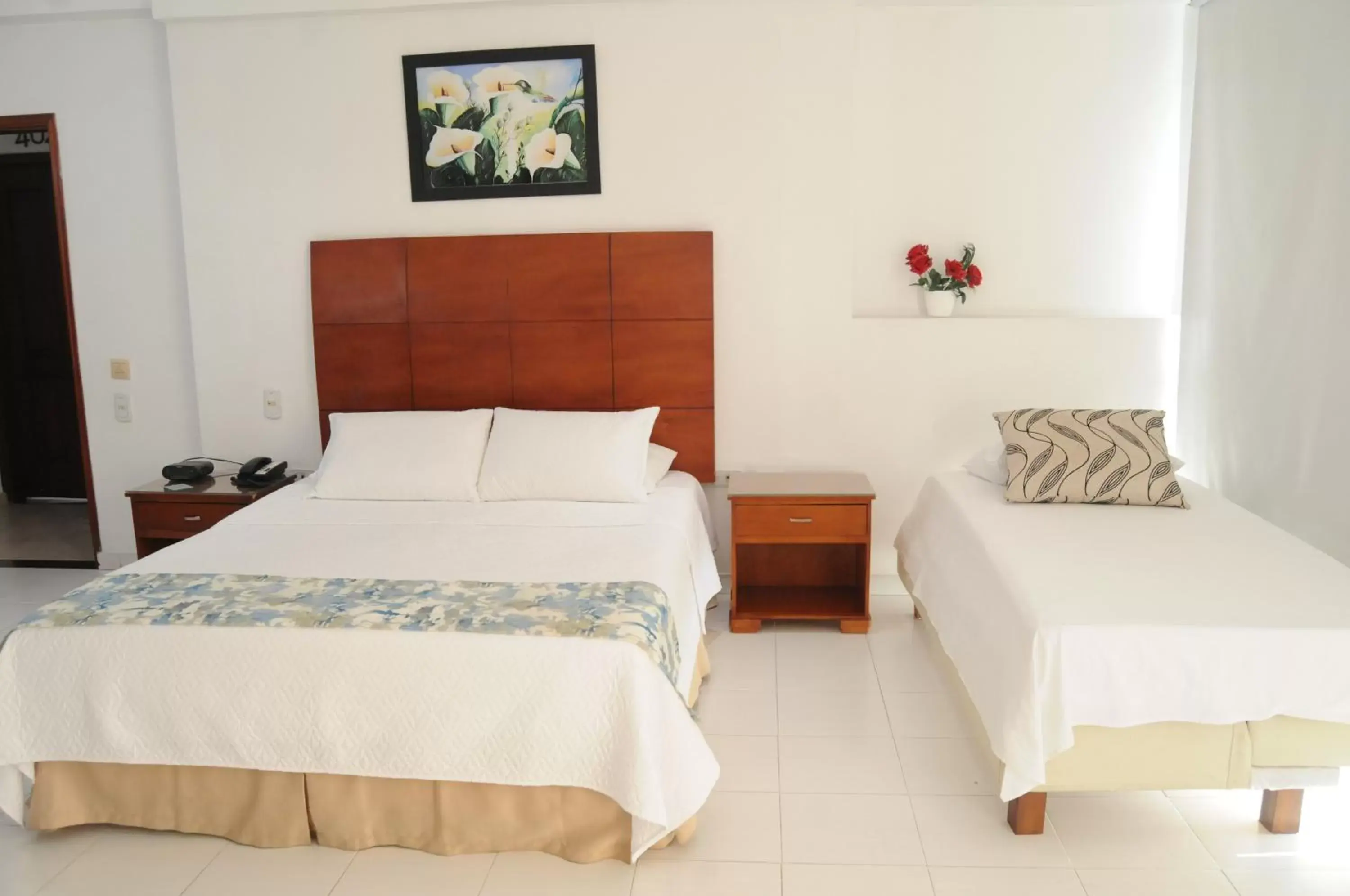 Guests, Bed in Coral Reef Hotel