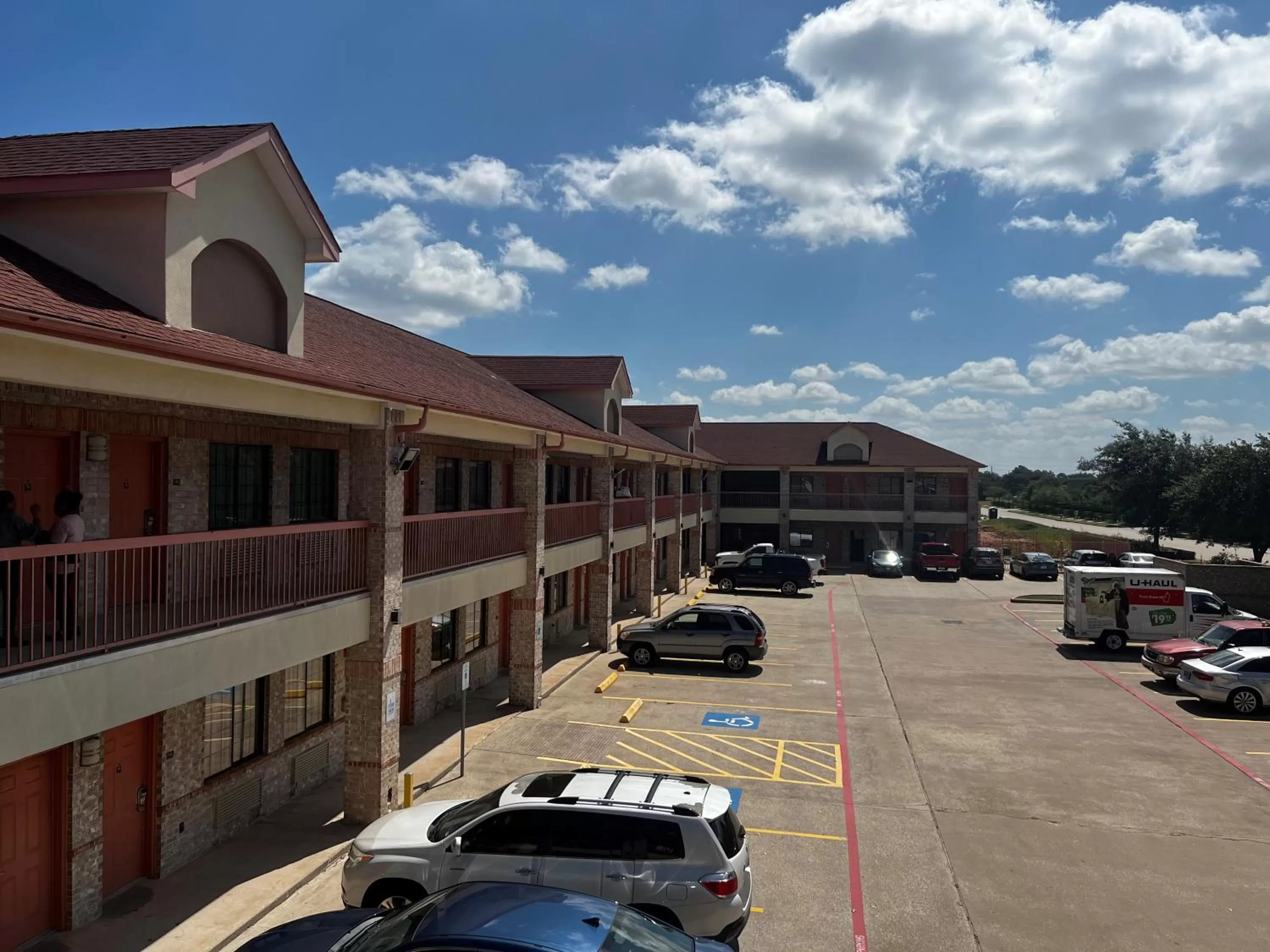 Property building in Super 8 by Wyndham Stafford Sugarland Area