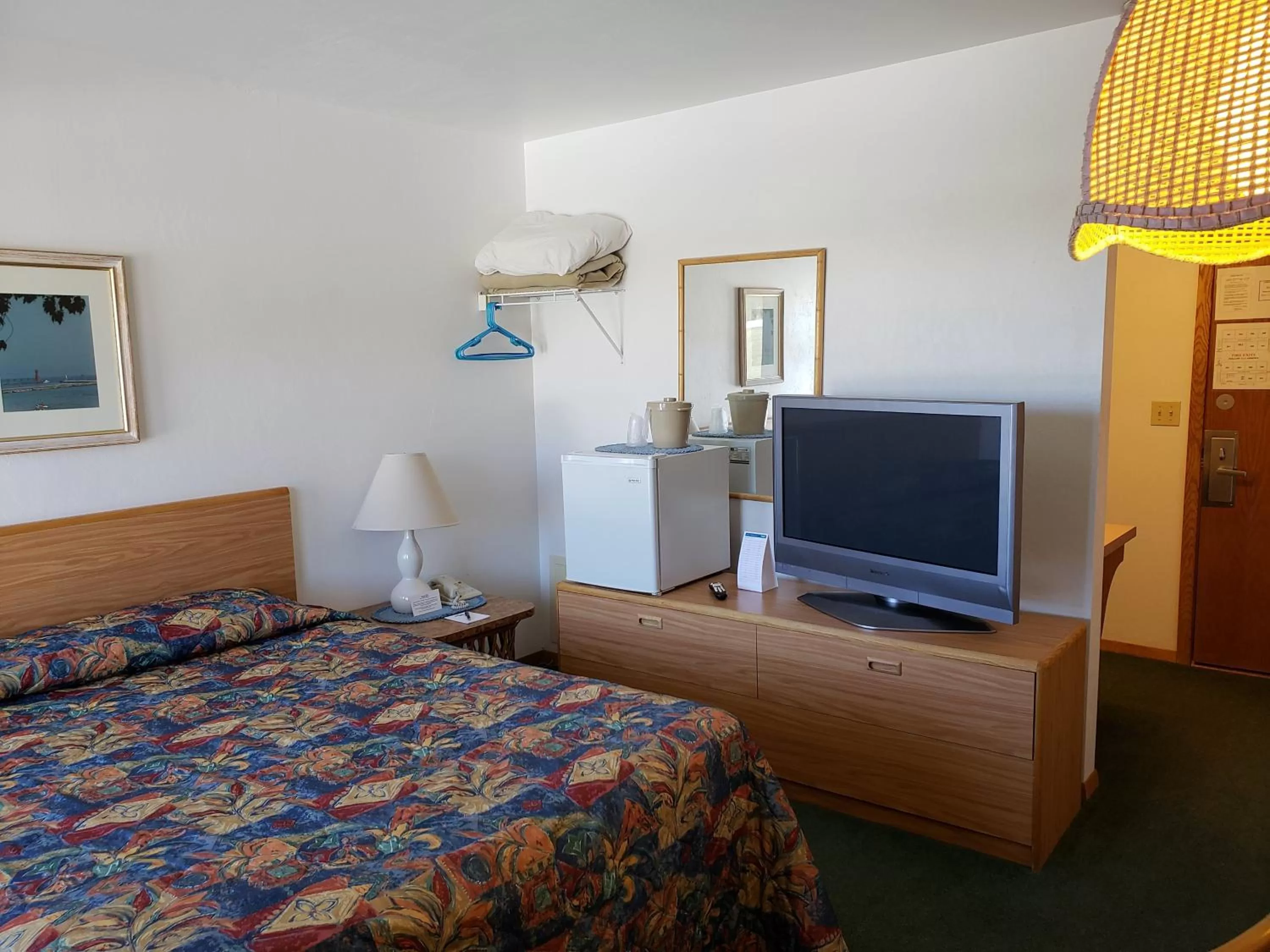 Bed in Algoma Beach Motel