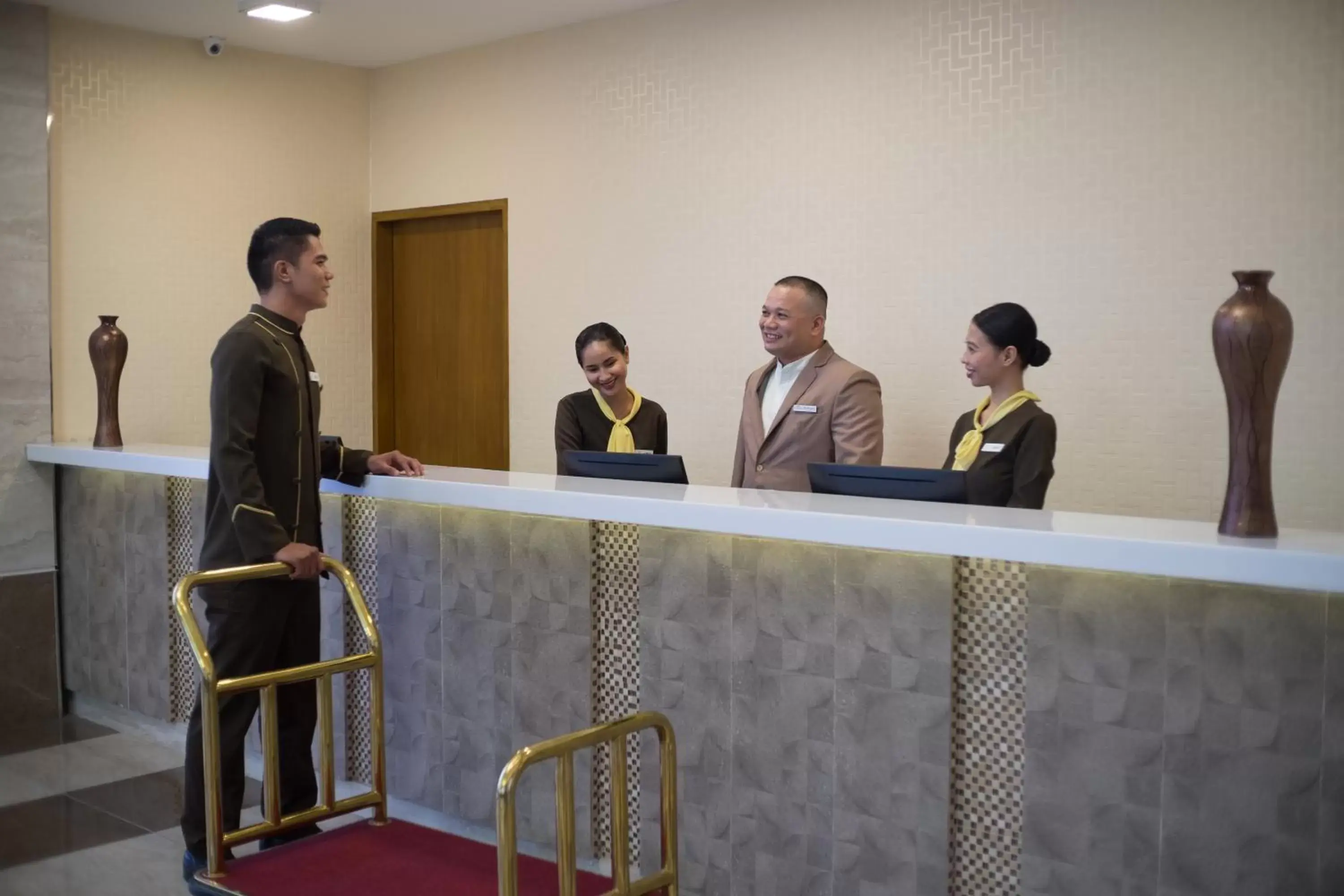 Staff in One Central Hotel & Suites