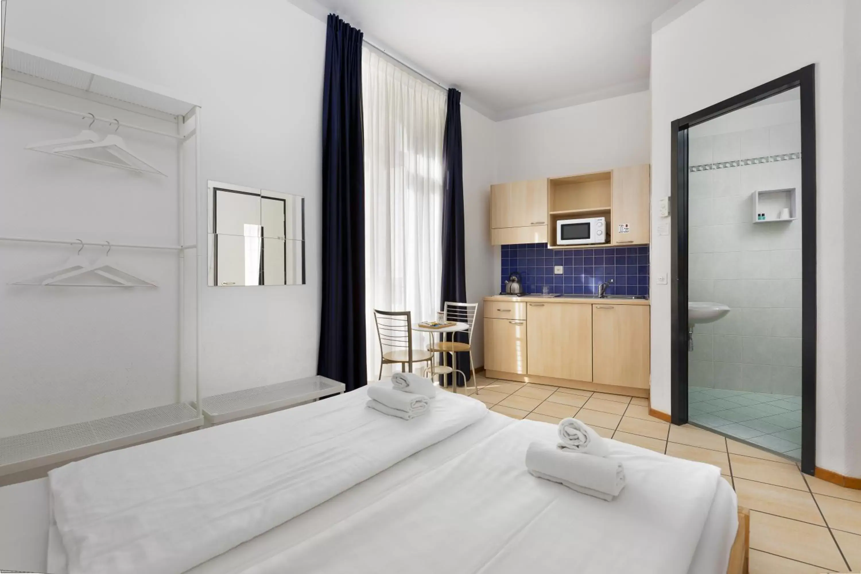 Bed in GuestHouse Lugano Center by LR