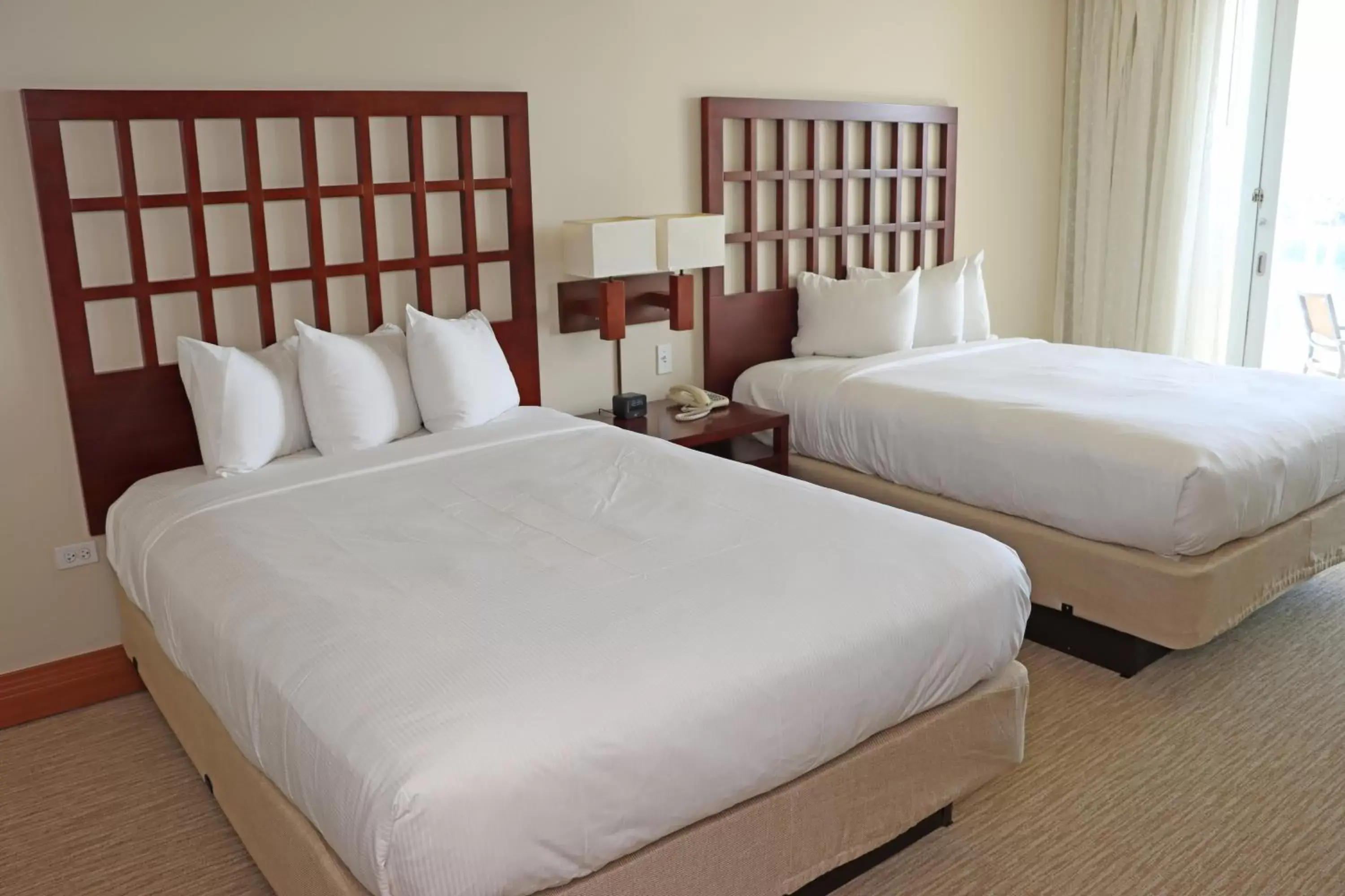 Bed in Costa Bahia Hotel Paseo Caribe