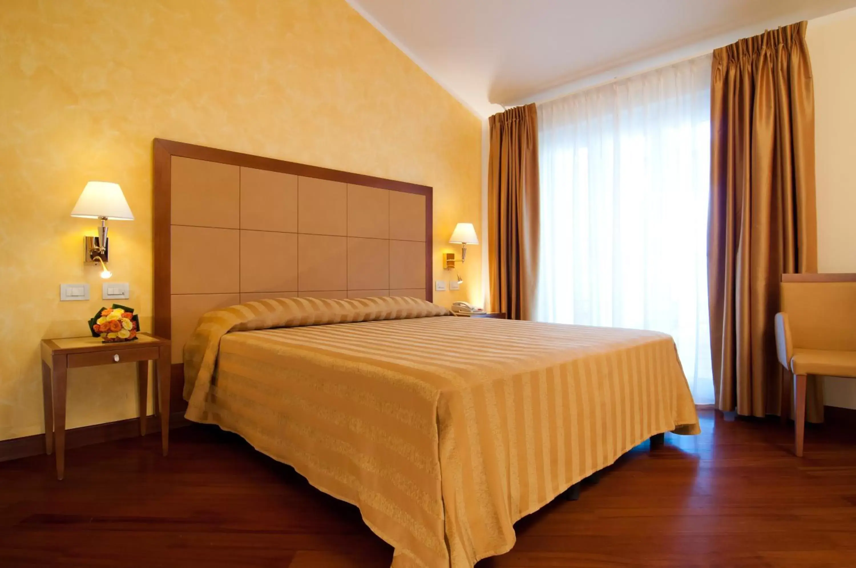 Bed in Versilia Palace Hotel