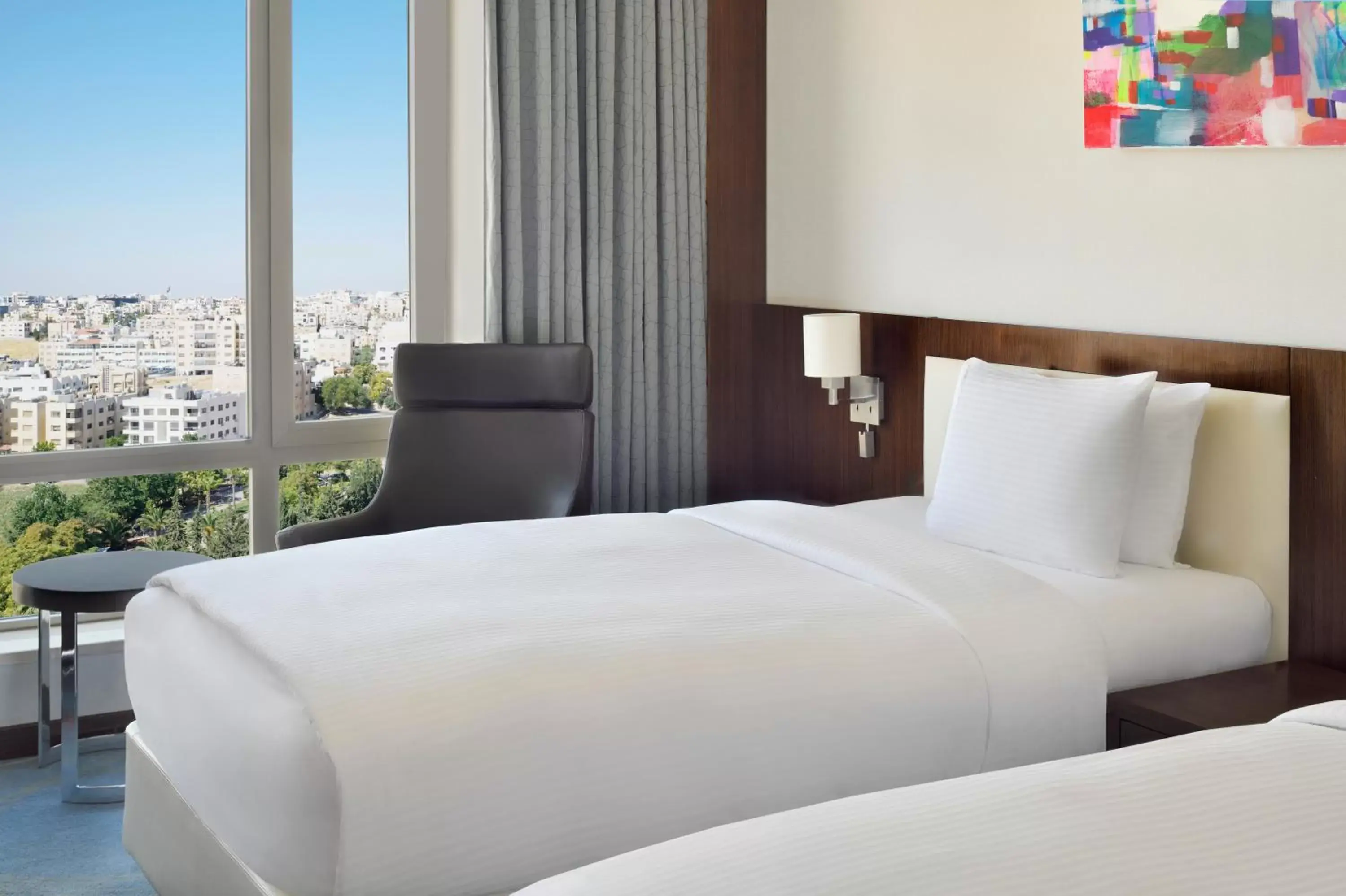 Bed in Mövenpick Hotel Amman
