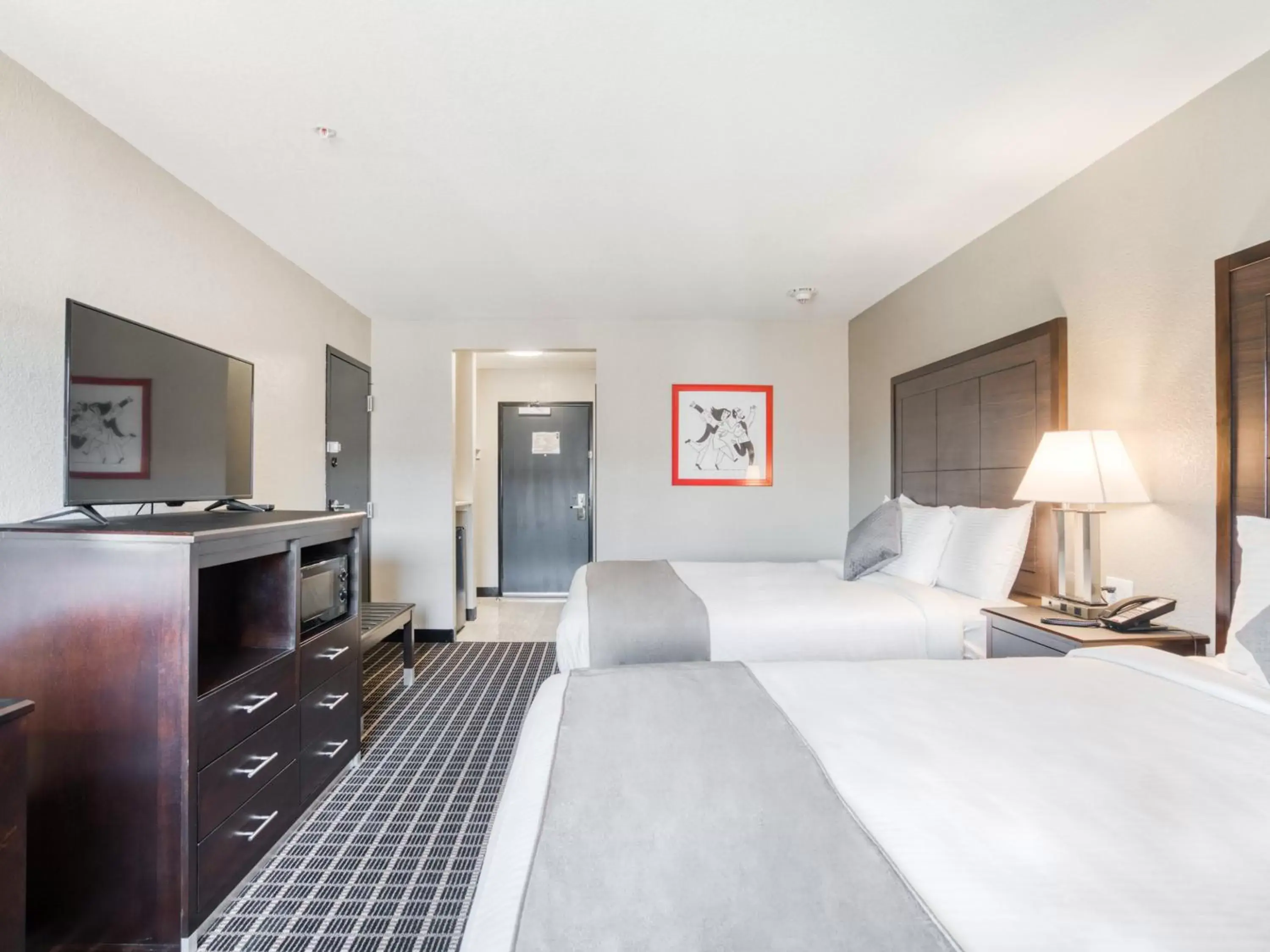 Bedroom, Bed in Alexis Hotel & Banquets Dallas Park Central Galleria