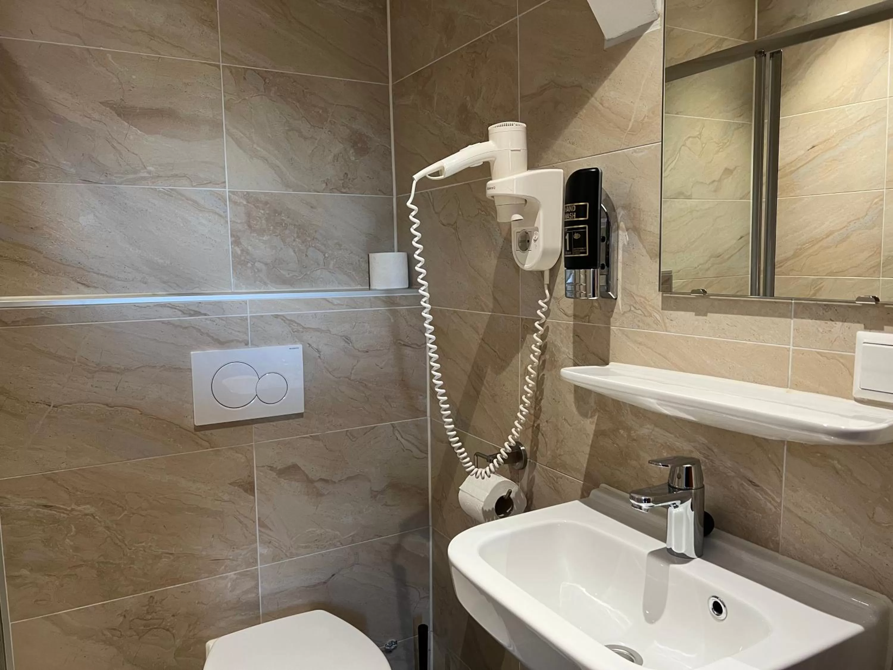 Bathroom in Blossoms City Hotel