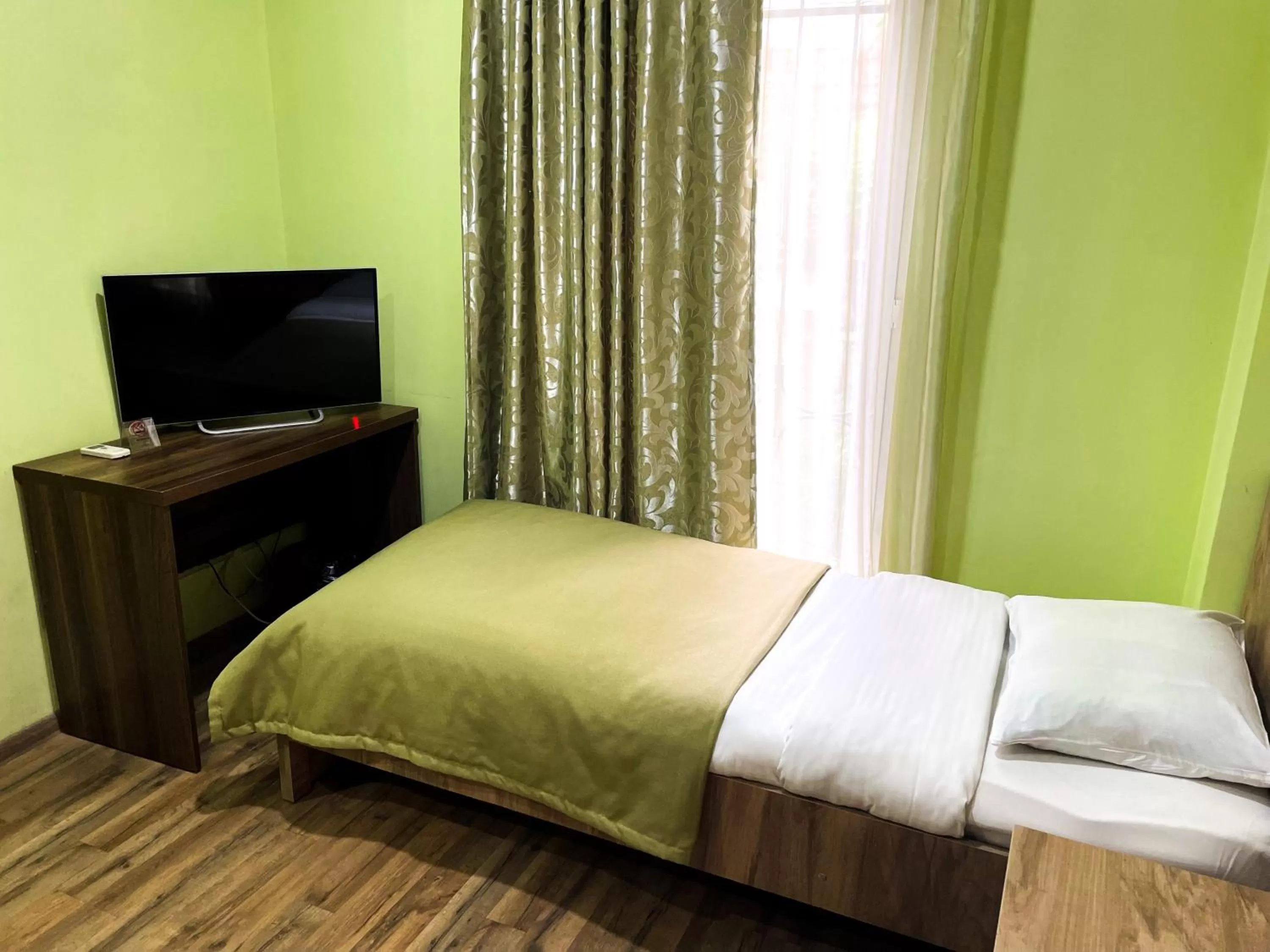 Bed in Hotel Dcorner