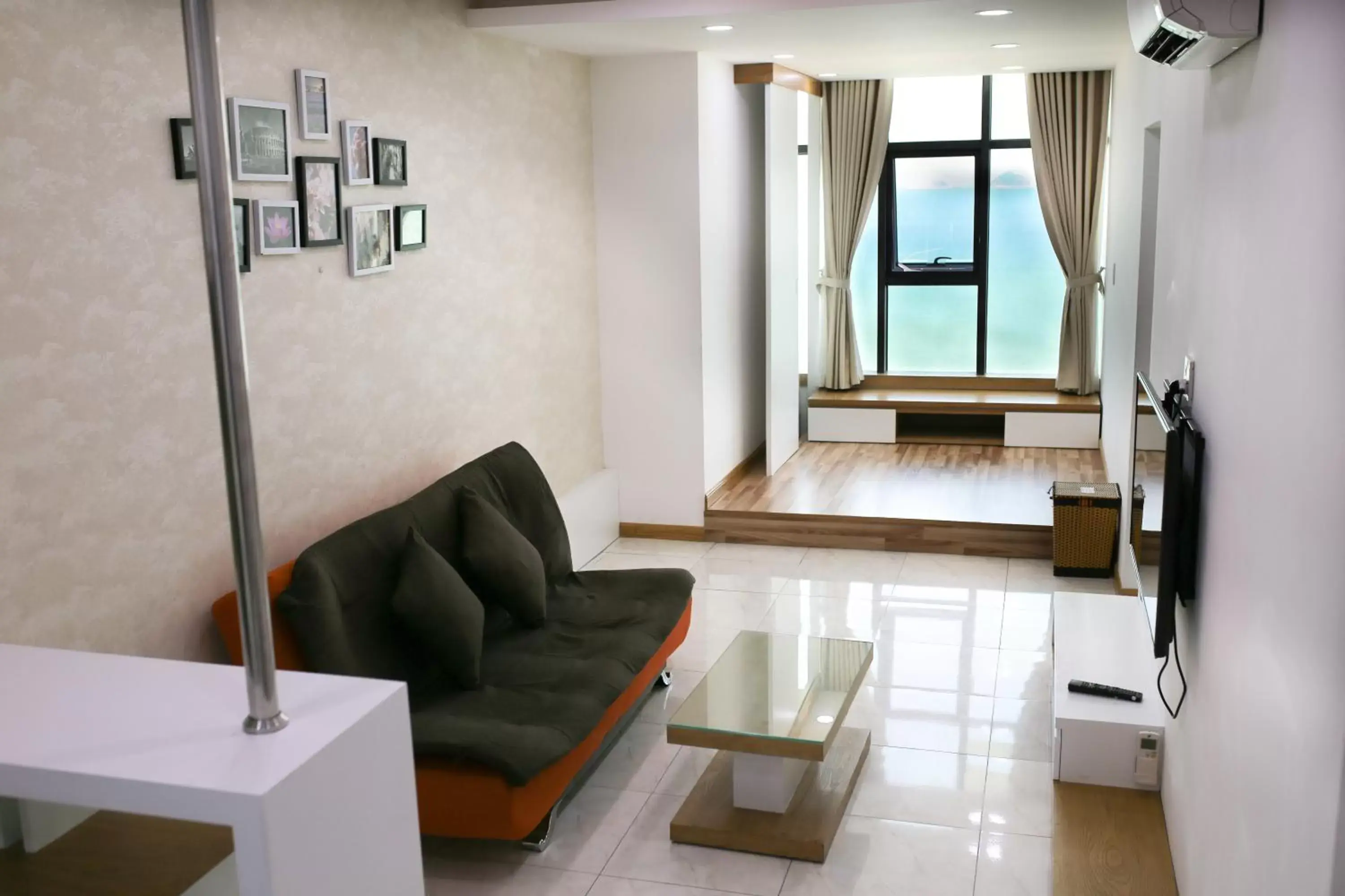 Communal lounge/ TV room, Seating Area in Gold Ocean Apartment