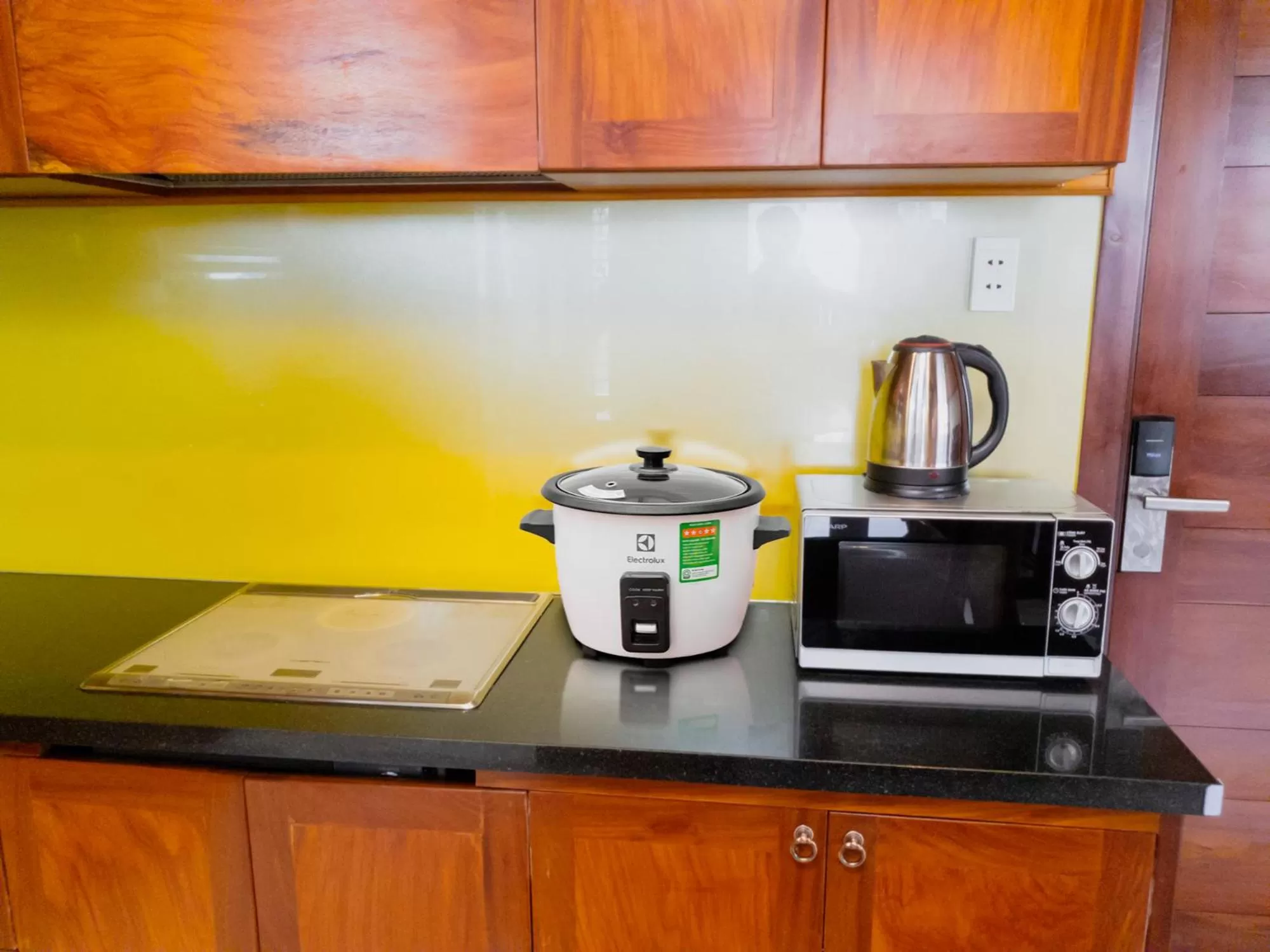 Kitchen or kitchenette, Kitchen/Kitchenette in LEHA Saigon Hotel Airport